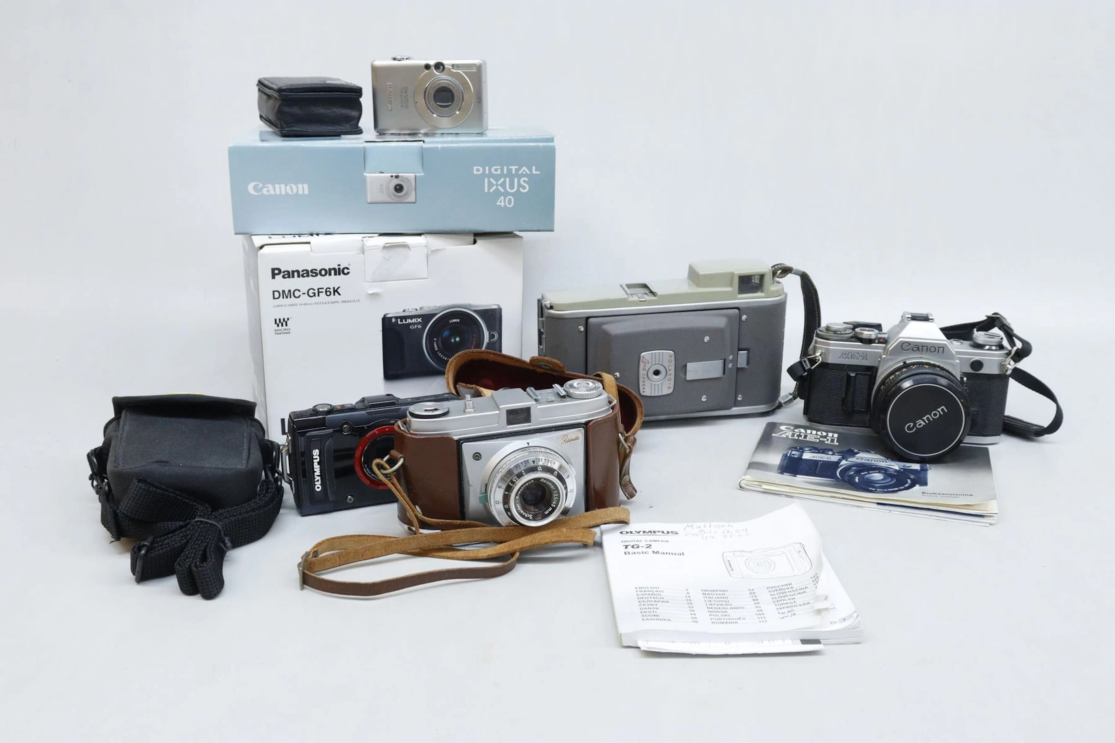 Kameror, bla Canon, Olympus, Kodak och äldre Polaroid