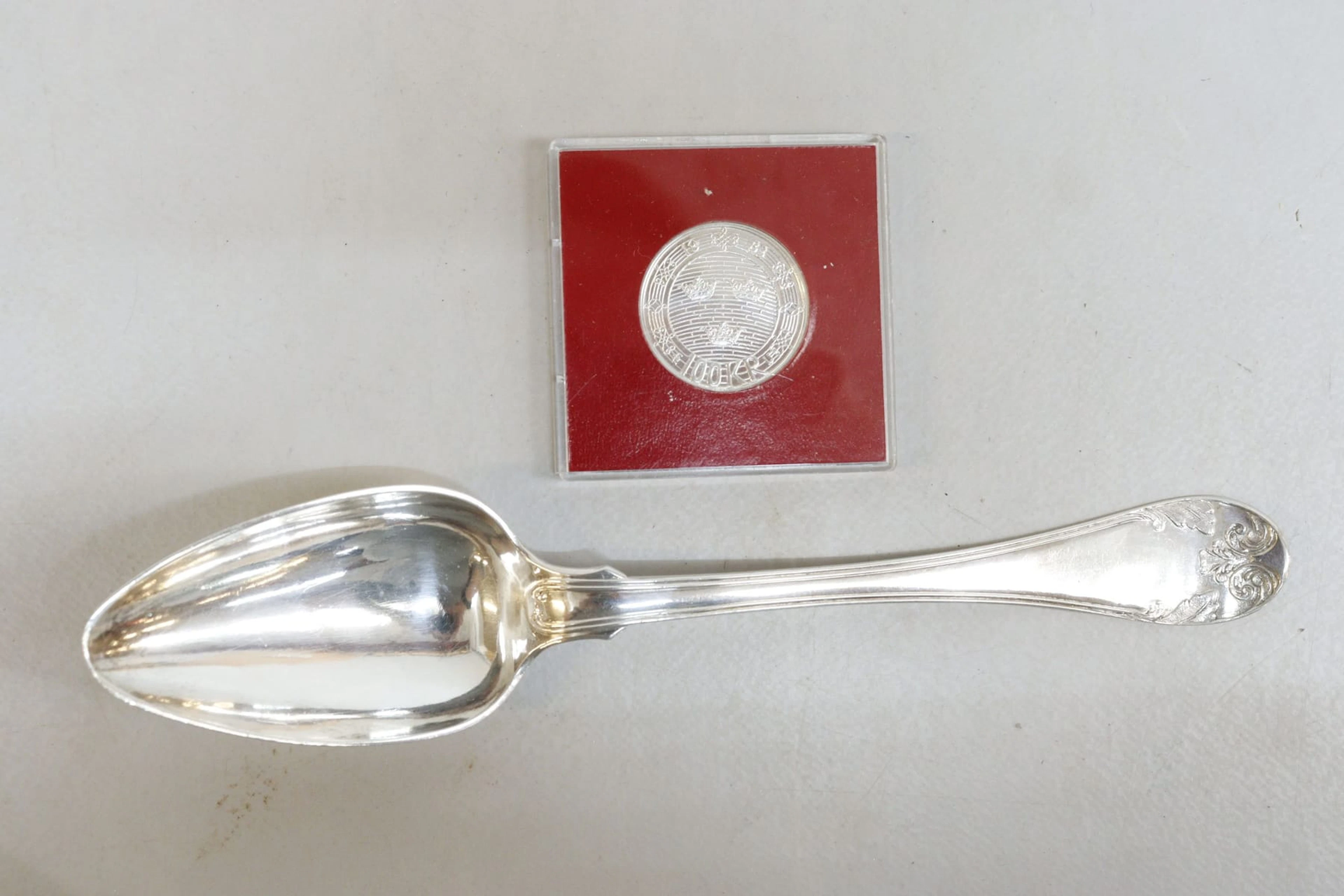 Sked och mynt, silver, vikt 70 gram