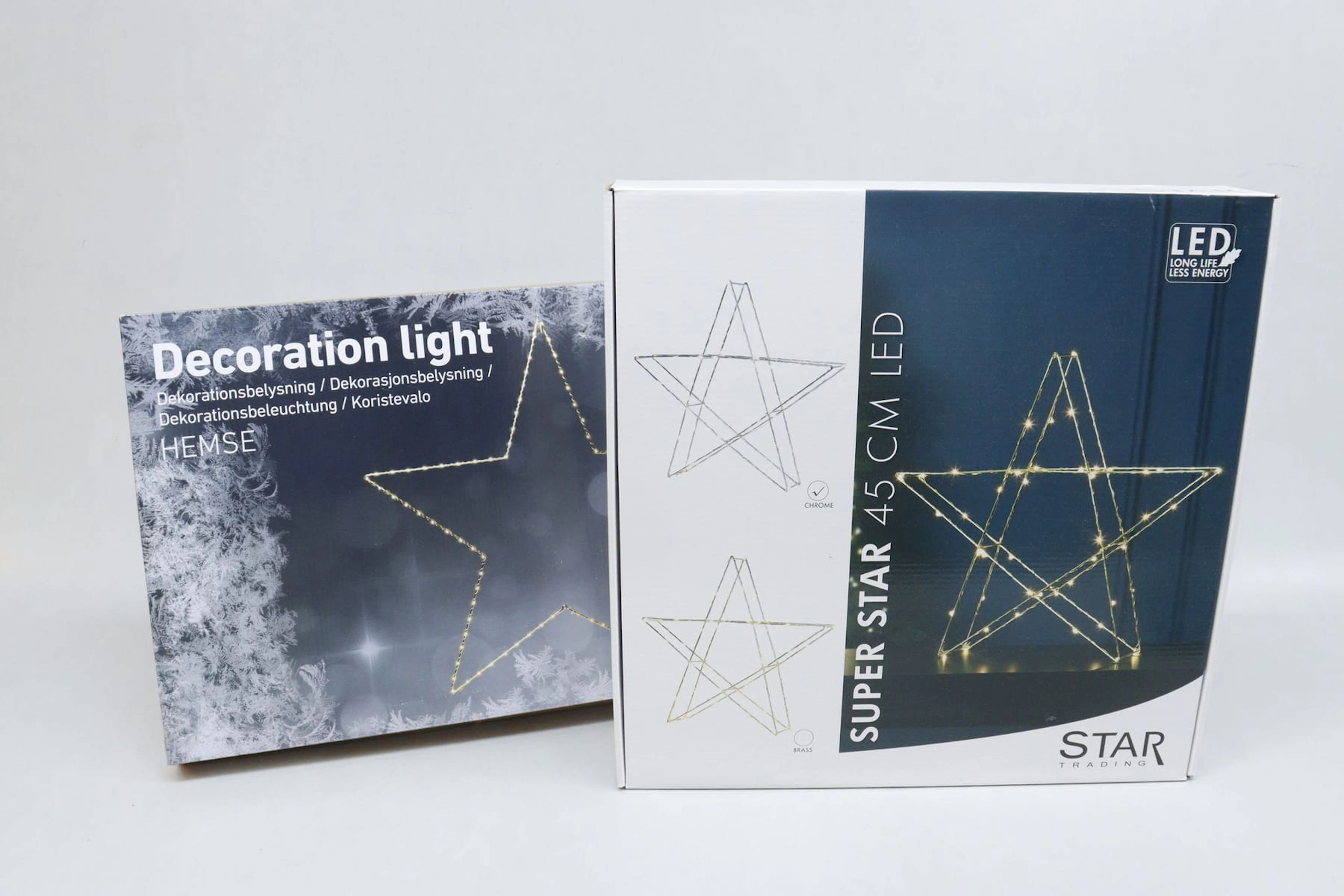 Julstjärnor 2st, led, mässing resp kromfärgad