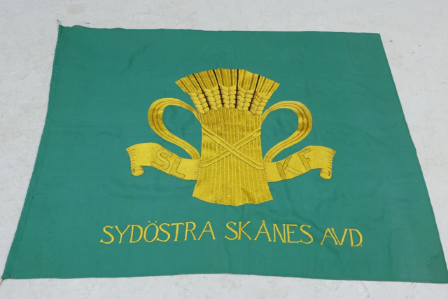 Flagga, broderad, SLKF, Svenska landskaps kvinnoförbund, Sydöstra Skånes avd