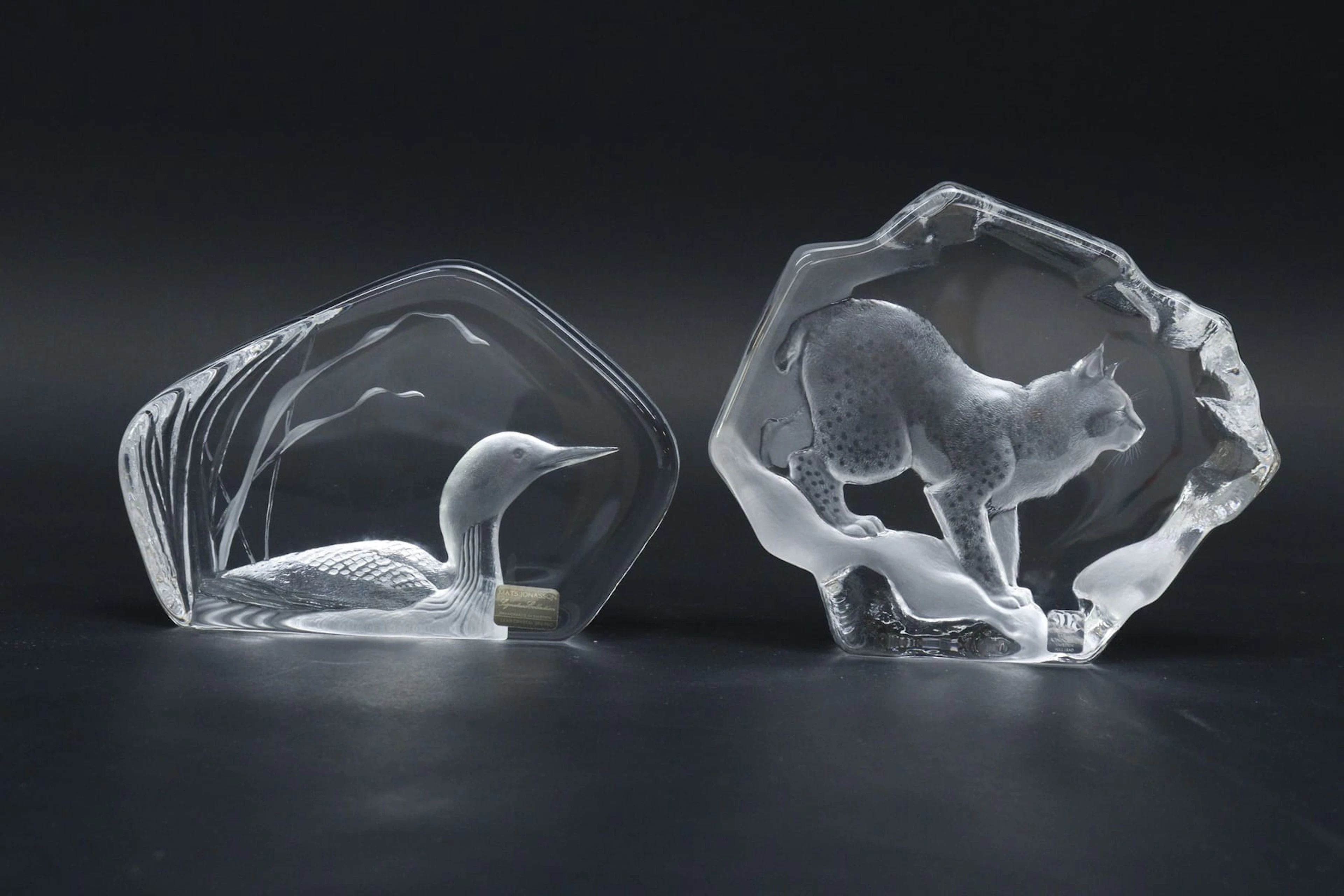Skulpturer, 2st, glas, Mats Jonasson, Målerås, lom och lodjur