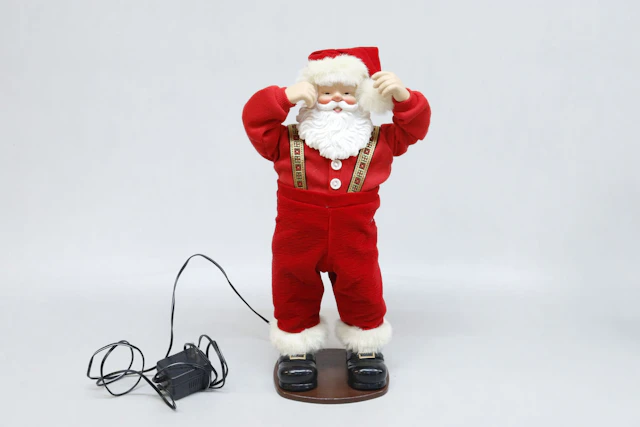 Dansande tomte, Rock Santa, i kartong