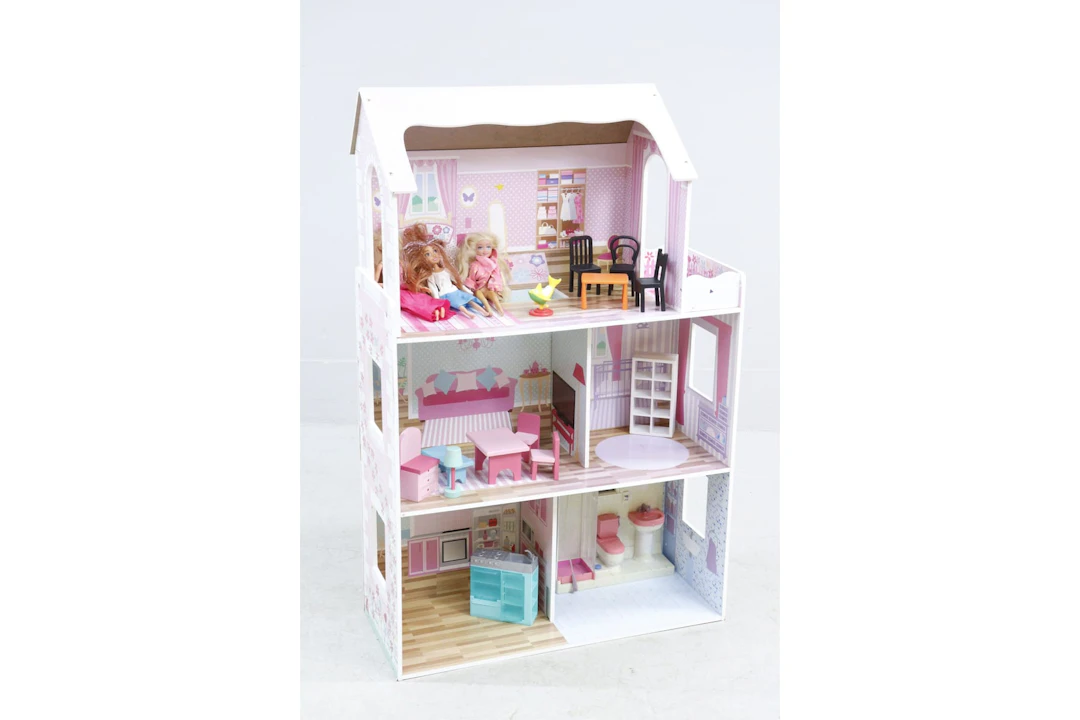 Dockhus med möbler och 2 Barbie-dockor