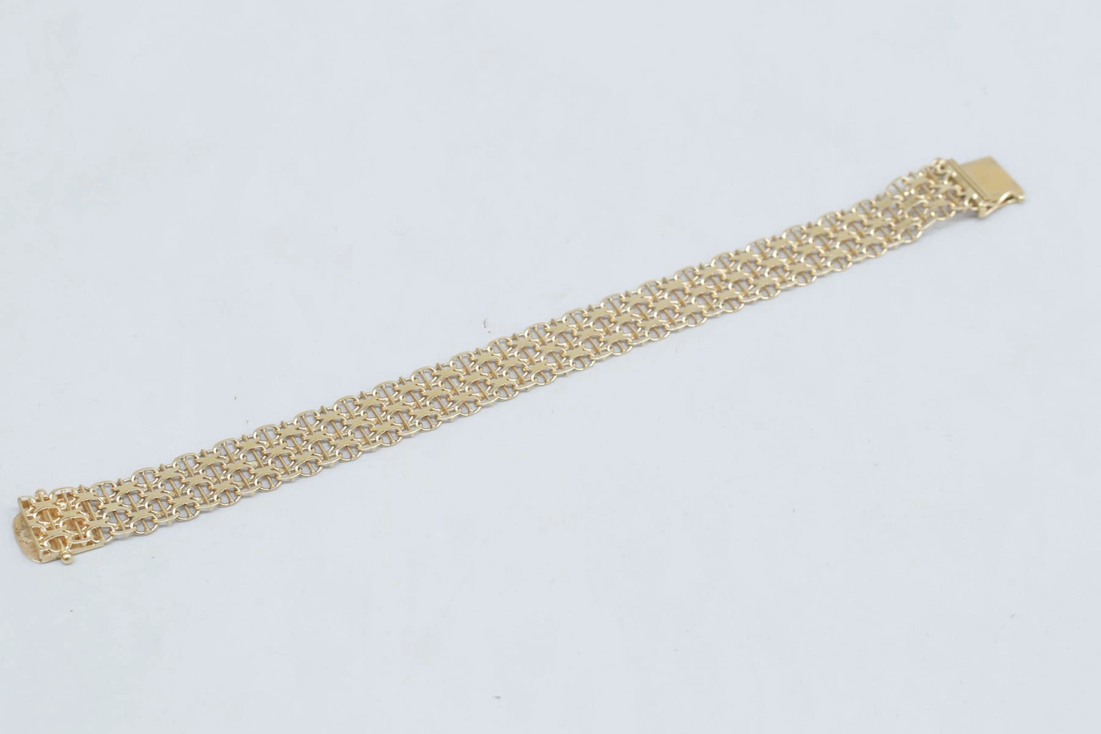 Armband, guld 18K, x-länk med stav, vikt 17 gram