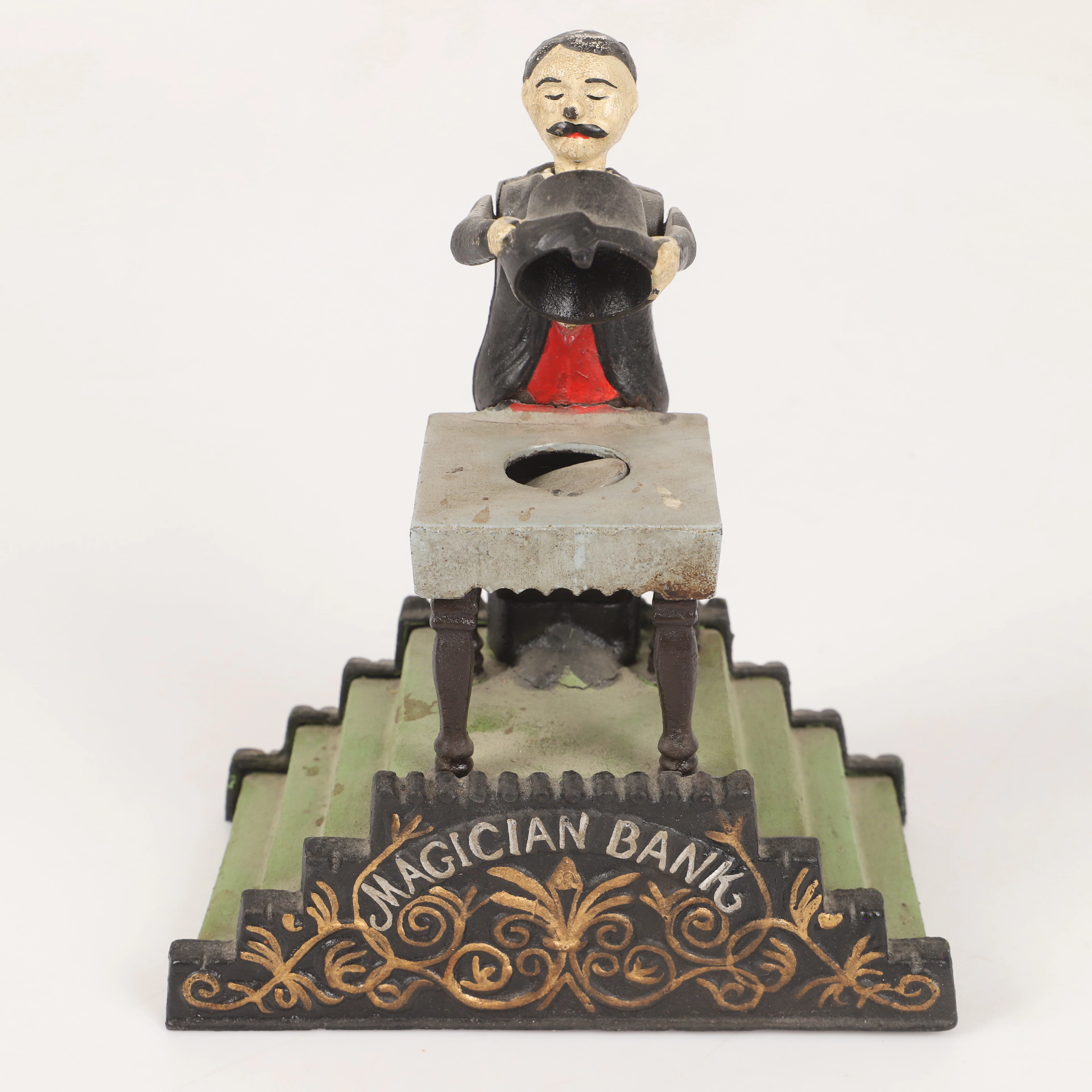 SPARBÖSSA, "Magician Bank", målat gjutjärn, tidigt 1900-tal.