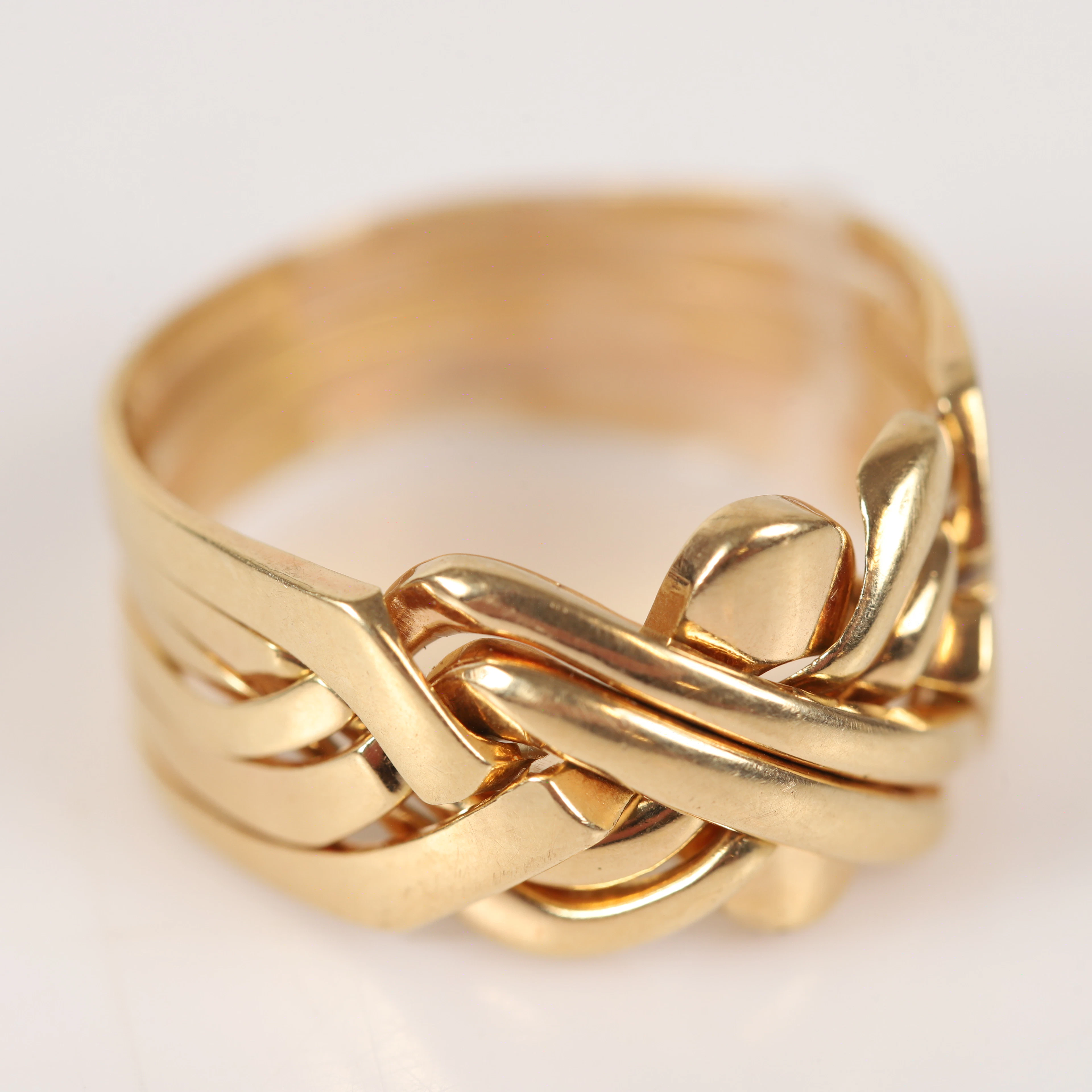 PUSSELRING, 6 delar, 18 K guld.