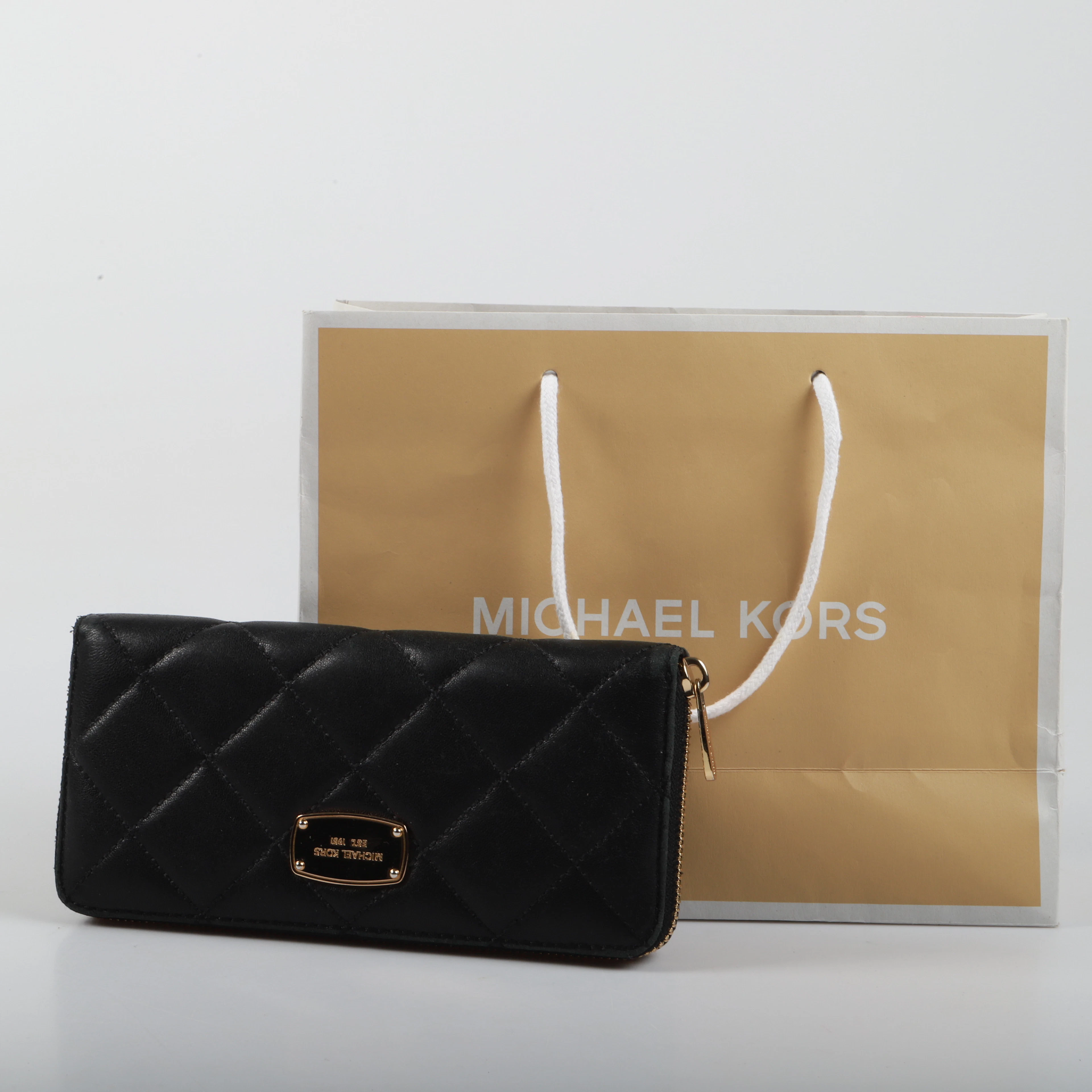 PLÅNBOK, quiltad läder, Michael Kors.
