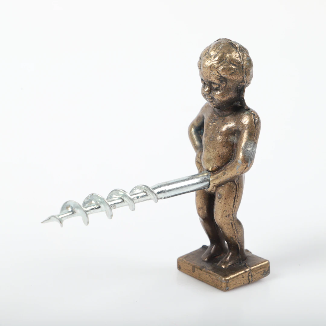 KORKSKRUV, "Manneken Pis", metall, 1950-tal.
