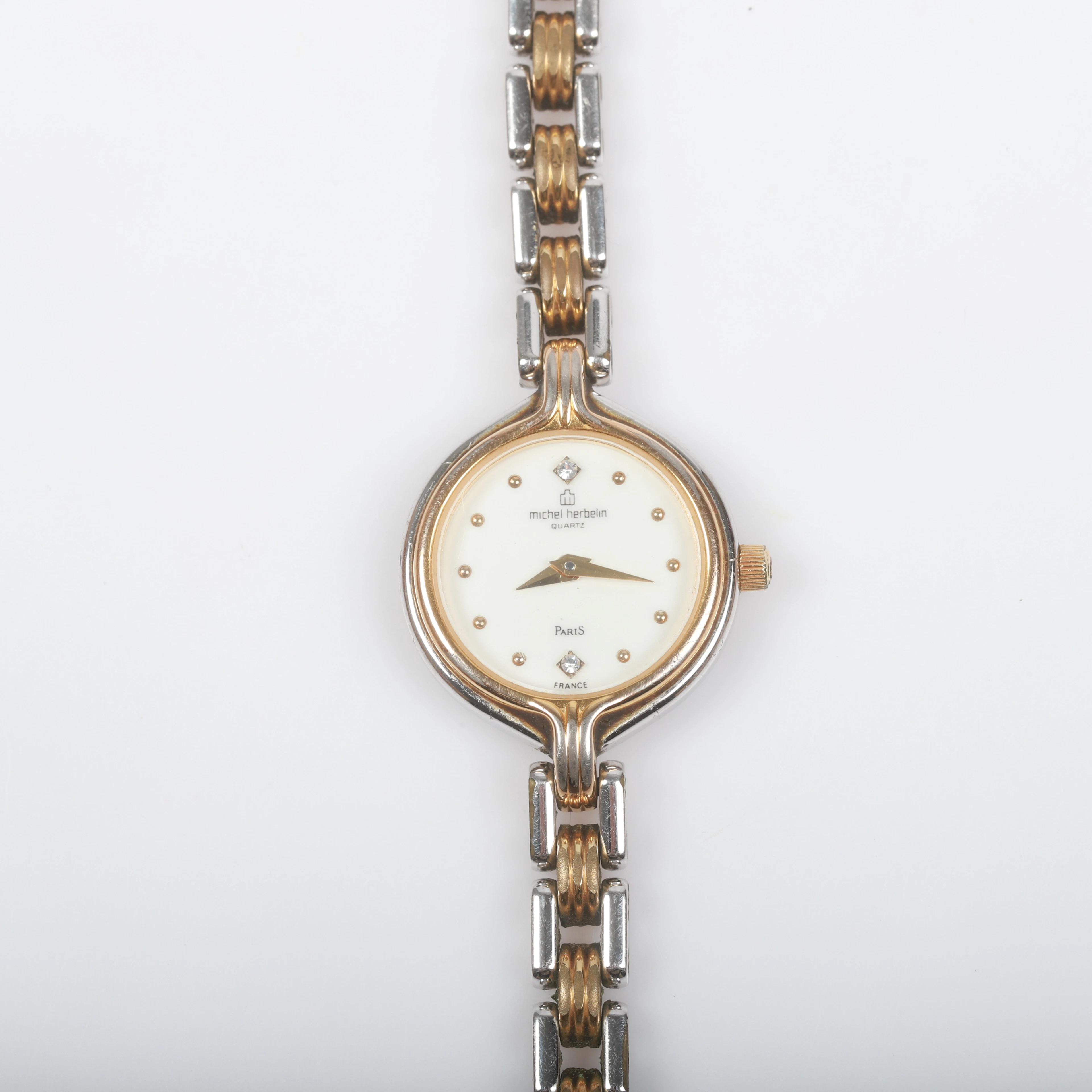 DAMARMBANDSUR, Michel Herbelin quartz, förgyllt stål, Paris.