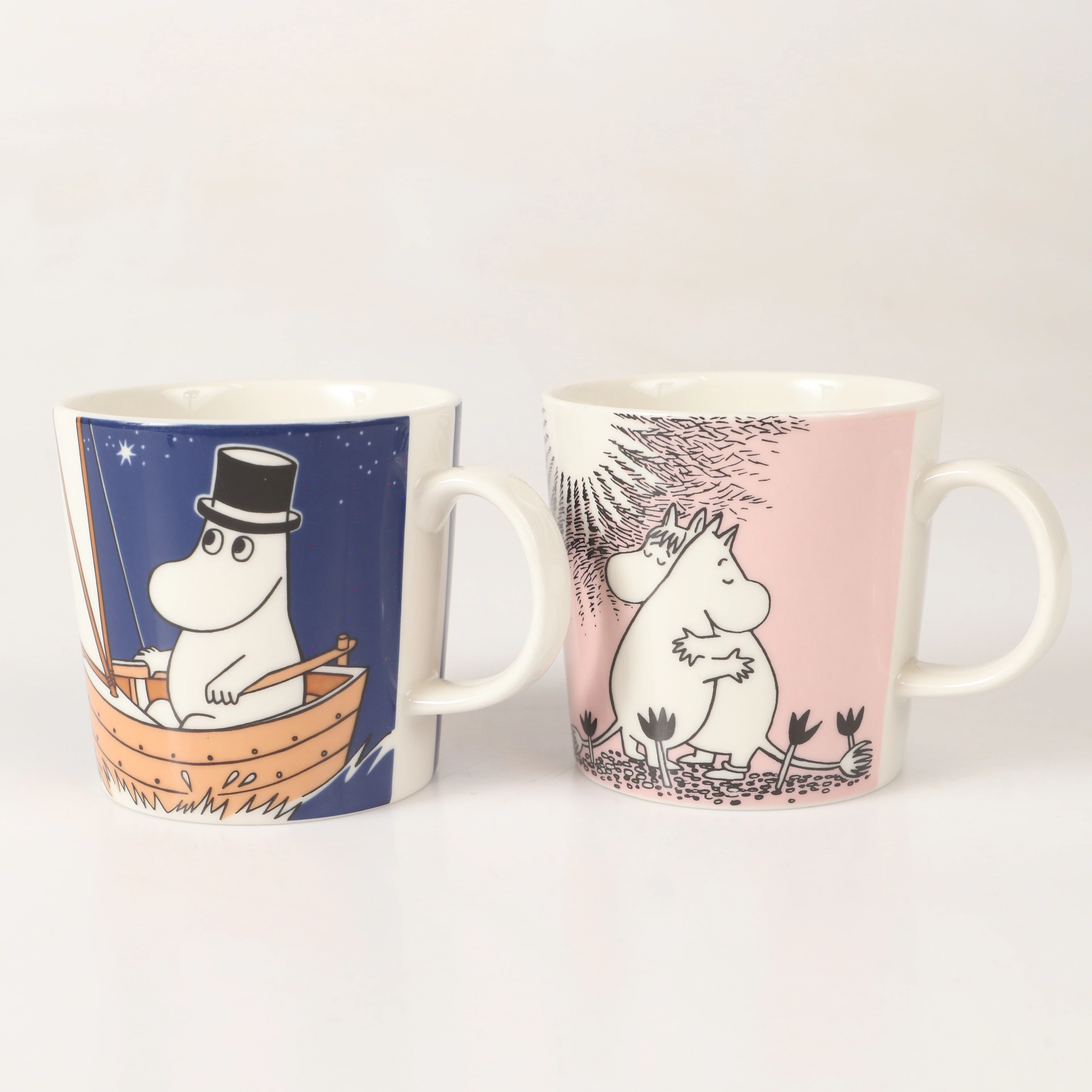 TOVE JANSSON. Muminmuggar, 2 stycken, porslin, Arabia, Finland.