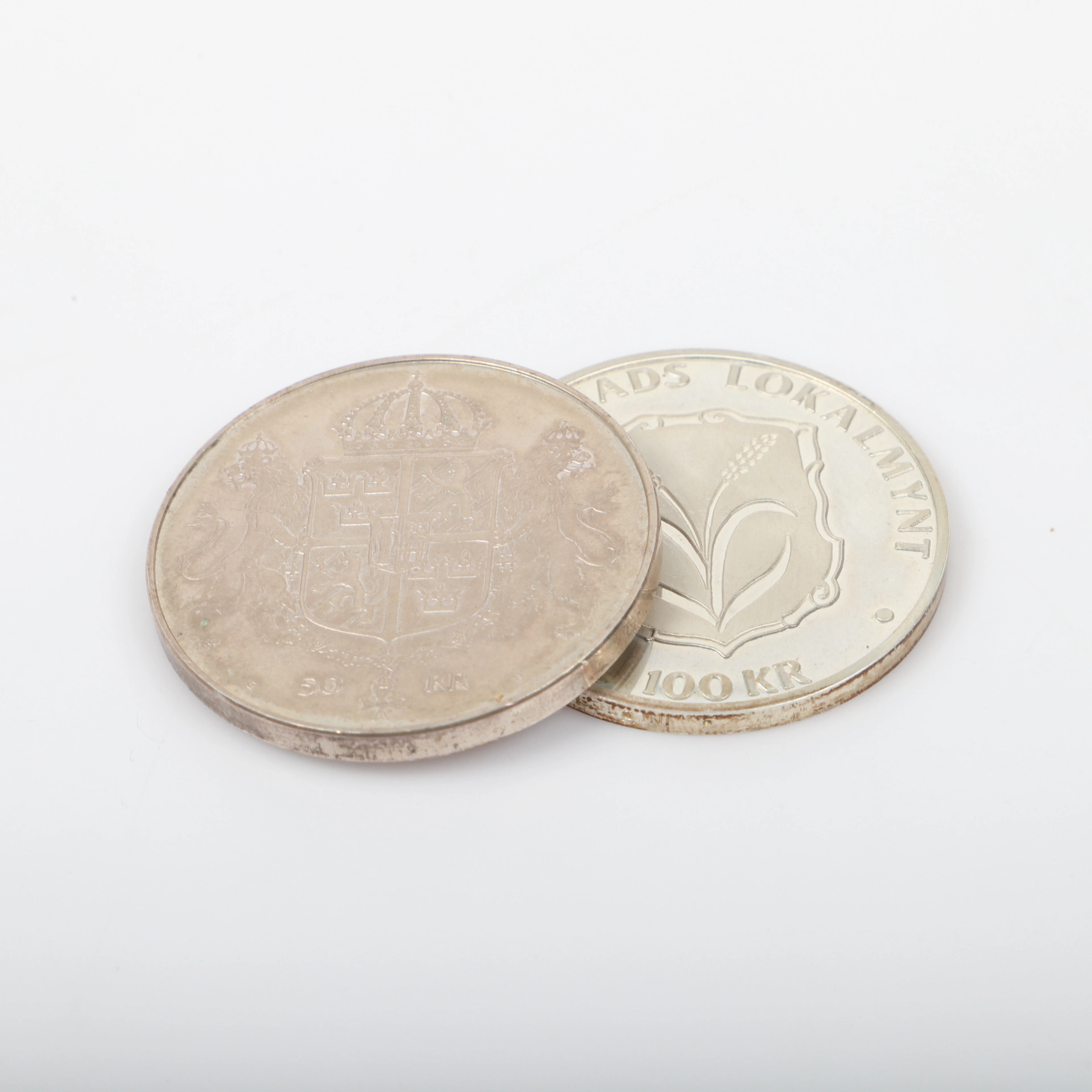 MINNESMYNT, 2 stycken, 50-100 kr, sterlingsilver, Sverige, 1976-1979.