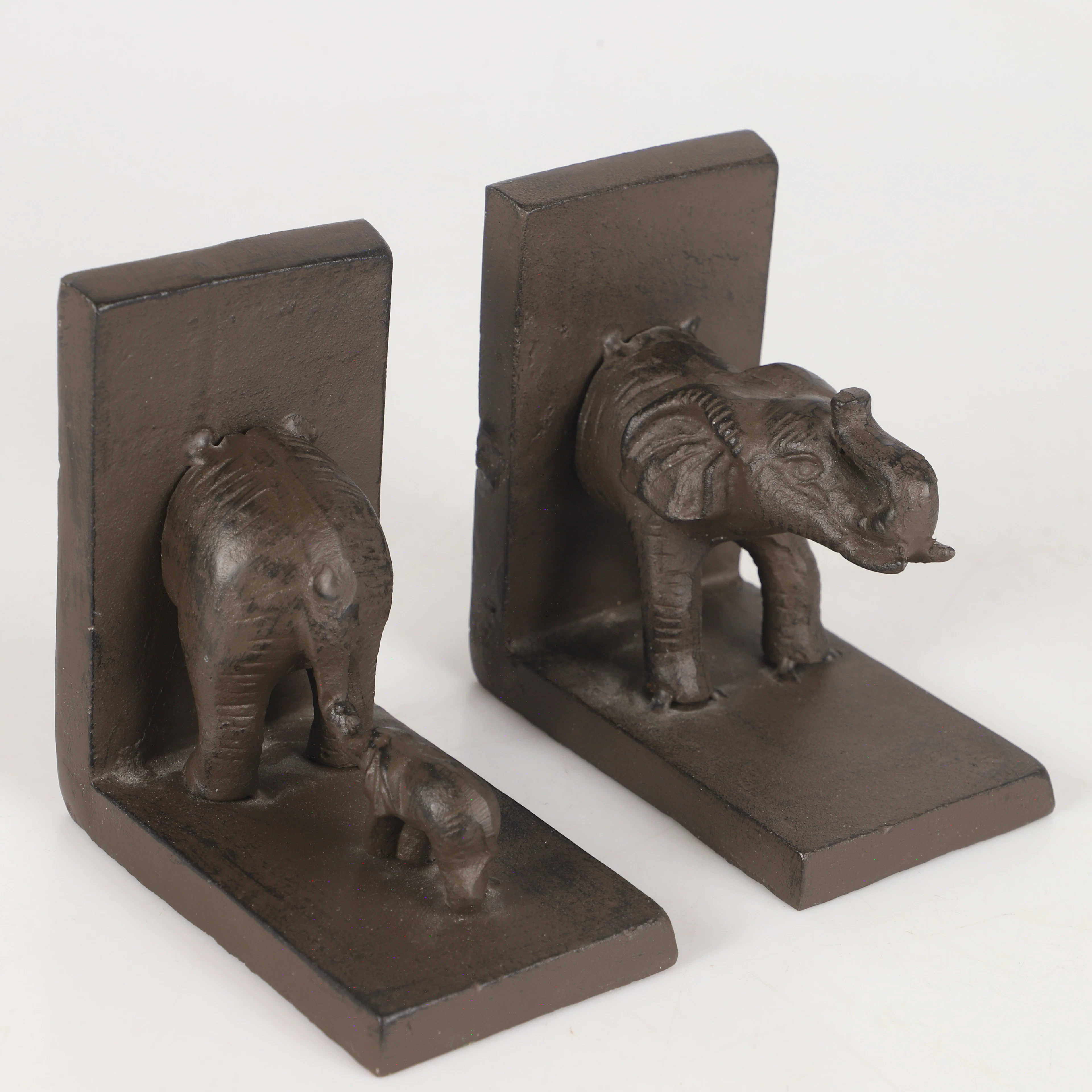 BOKSTÖD, 1 par i form av elefant, metall.