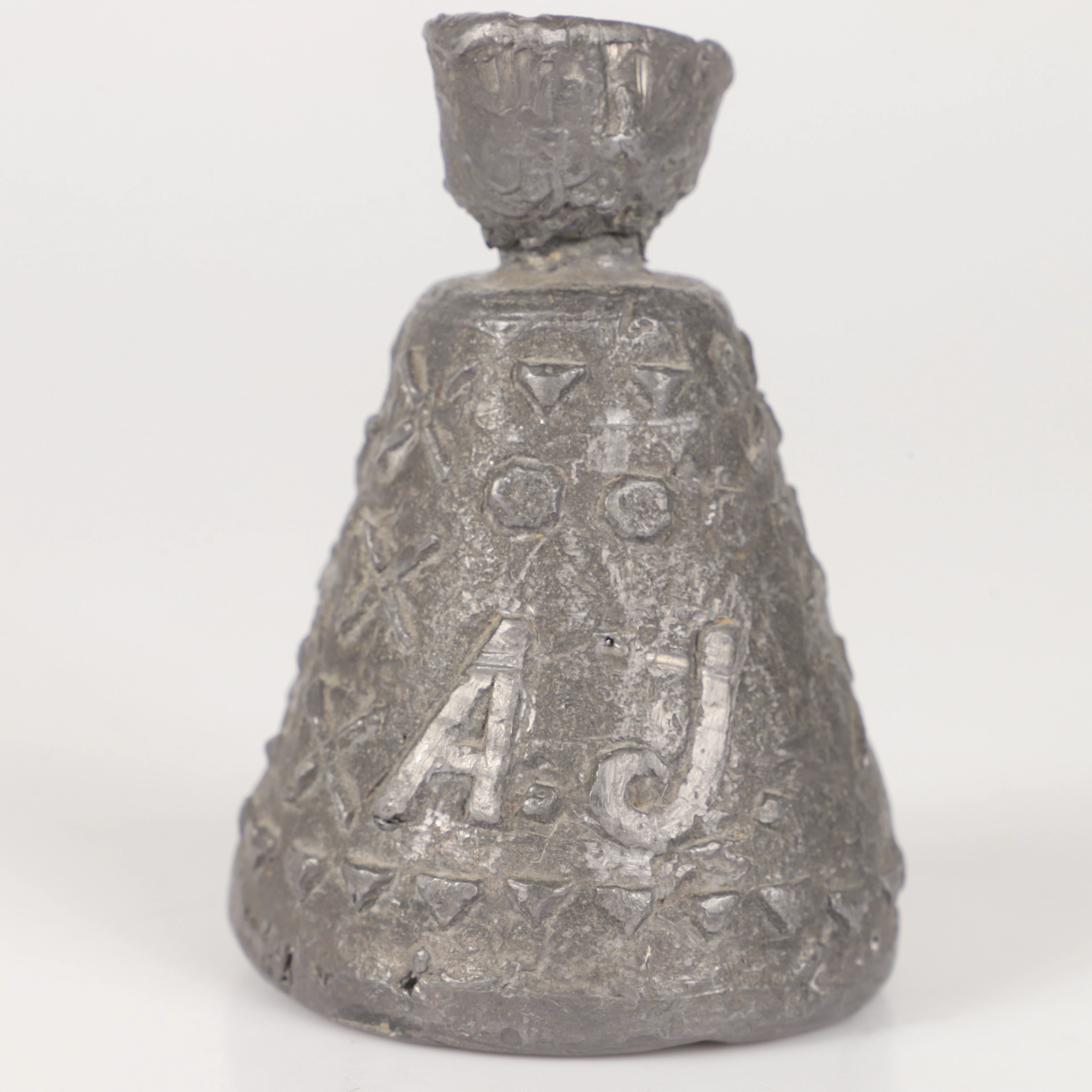 Vikt, metall med ägarmärke, tidigt 1900-tal.