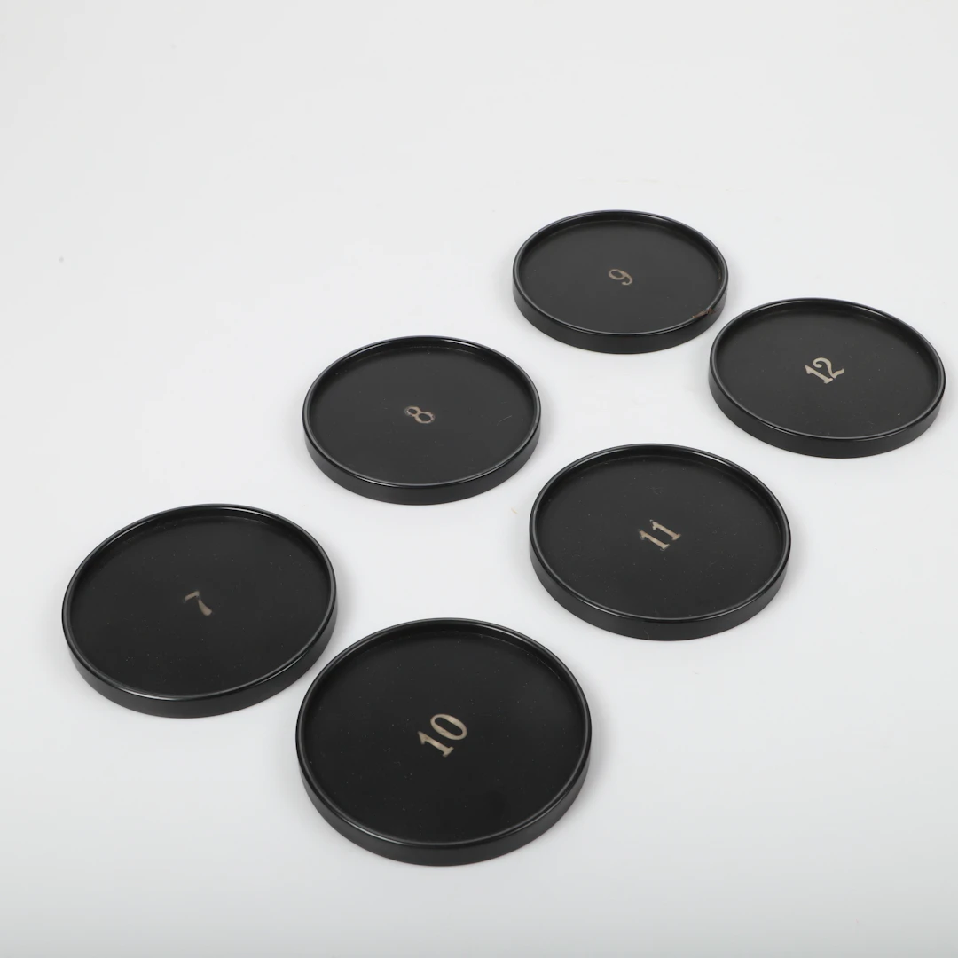 WILHELMINA "TIDDIT" WENDT (1896-1988). Coasters, 6 stycken, isolit/bakelit