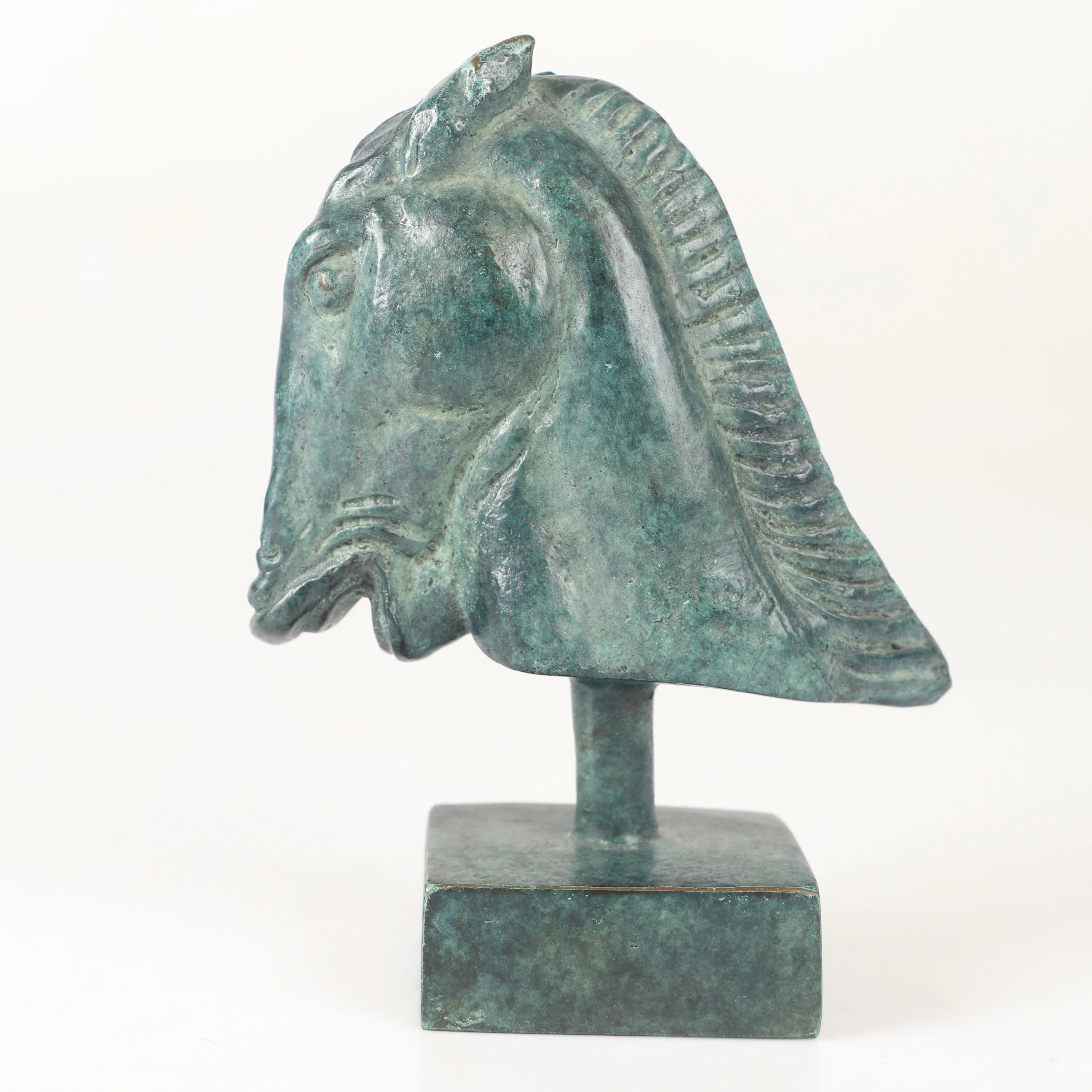 CARL MILLES. EFTER. Hästhuvud, grönpatinerad brons.