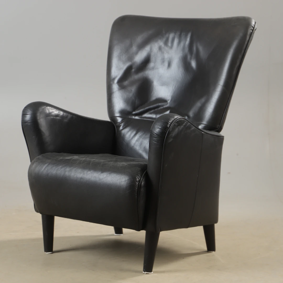 CARL-HENRIK SPAK. Vilfåtölj, "Stepp", skinnklädd, Swedese, 2000-tal.