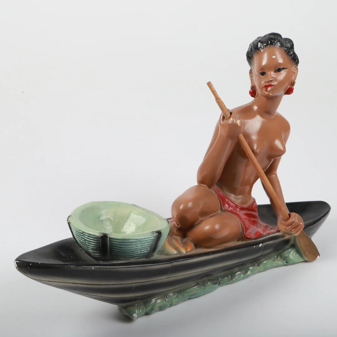 FIGURIN, paddlande kvinna, målad gips, 1900-tal.