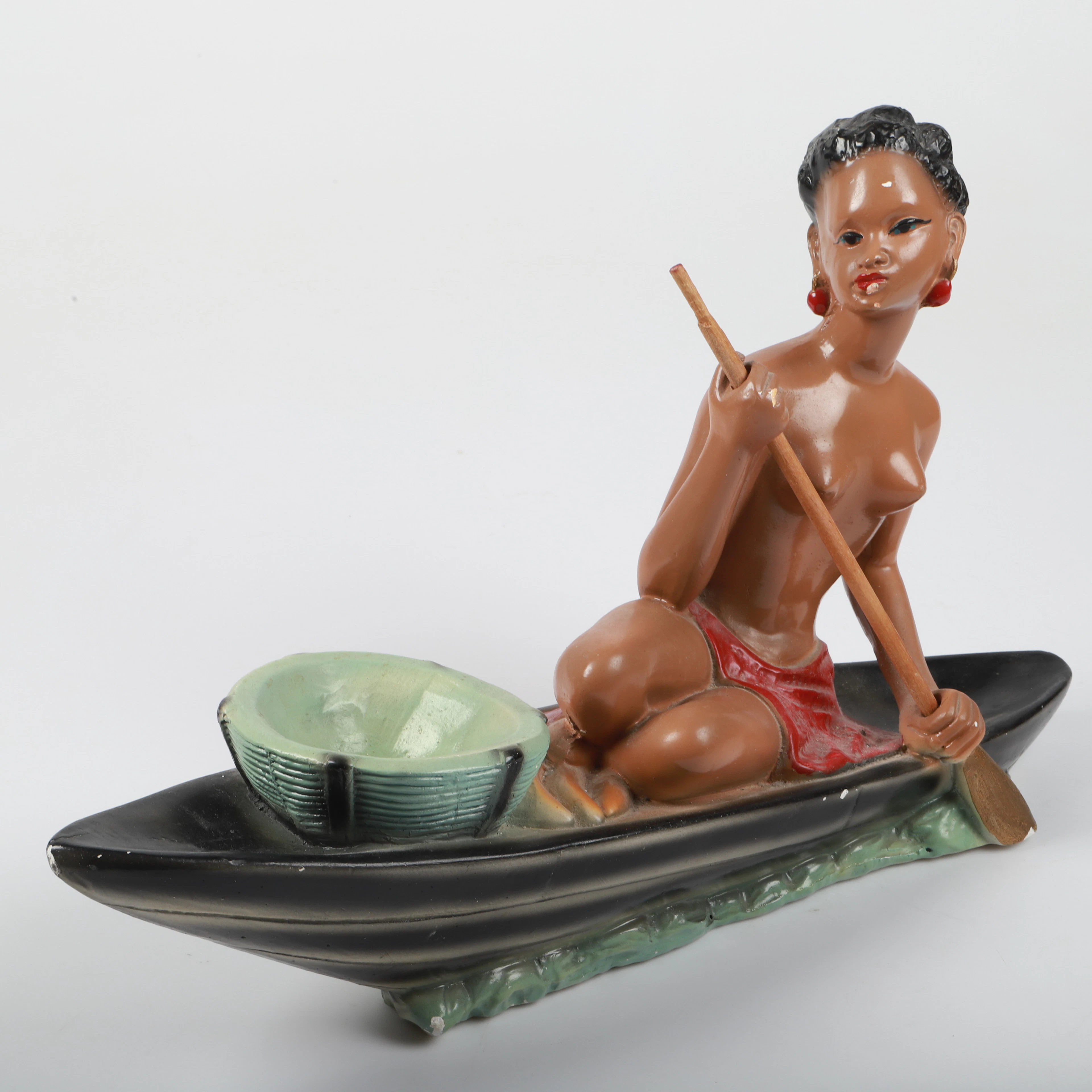 FIGURIN, paddlande kvinna, målad gips, 1900-tal.