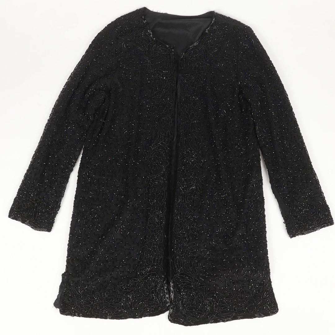 KOFTA, textil med pärlbroderier, 1900-talets senare del/2000-tal.