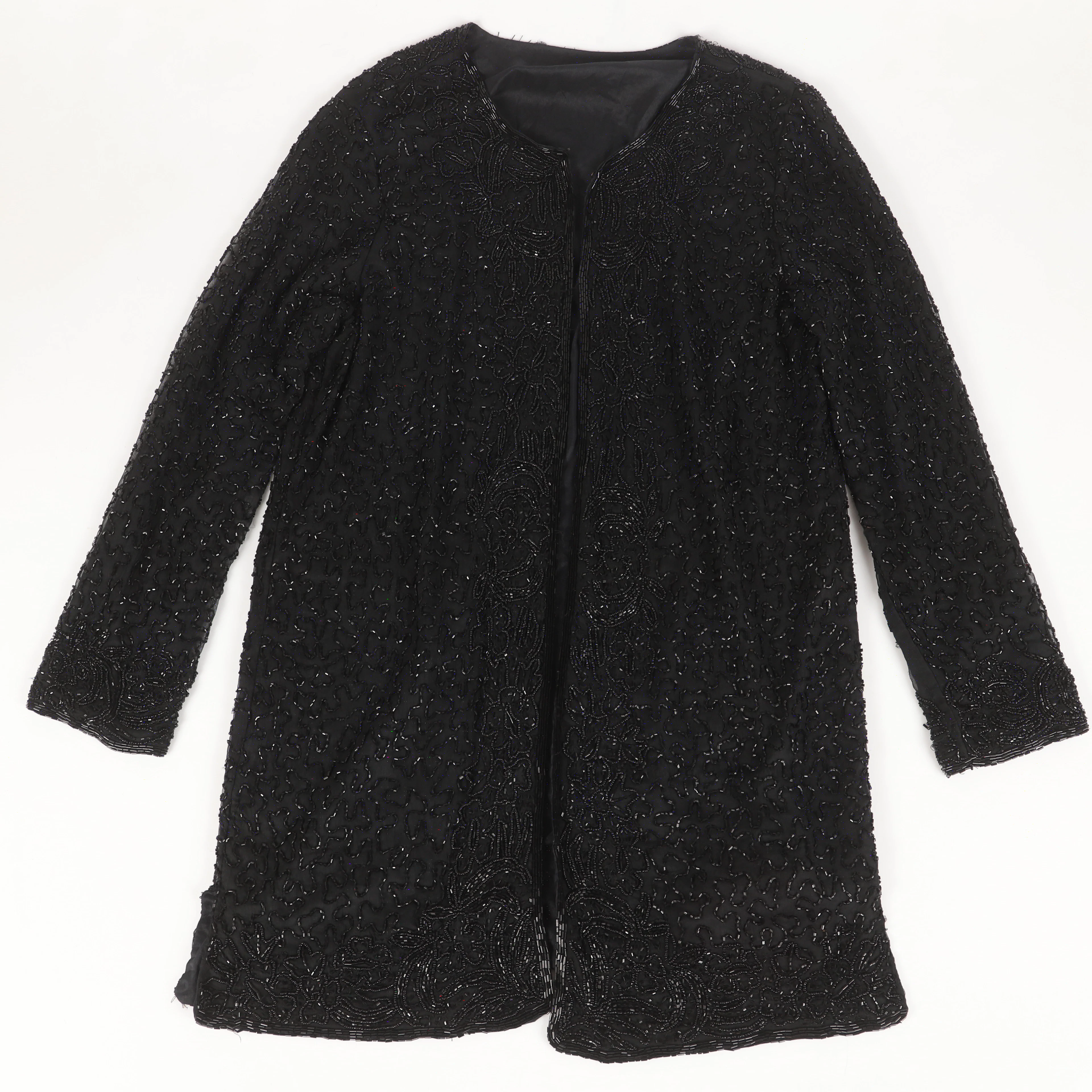 KOFTA, textil med pärlbroderier, 1900-talets senare del/2000-tal.