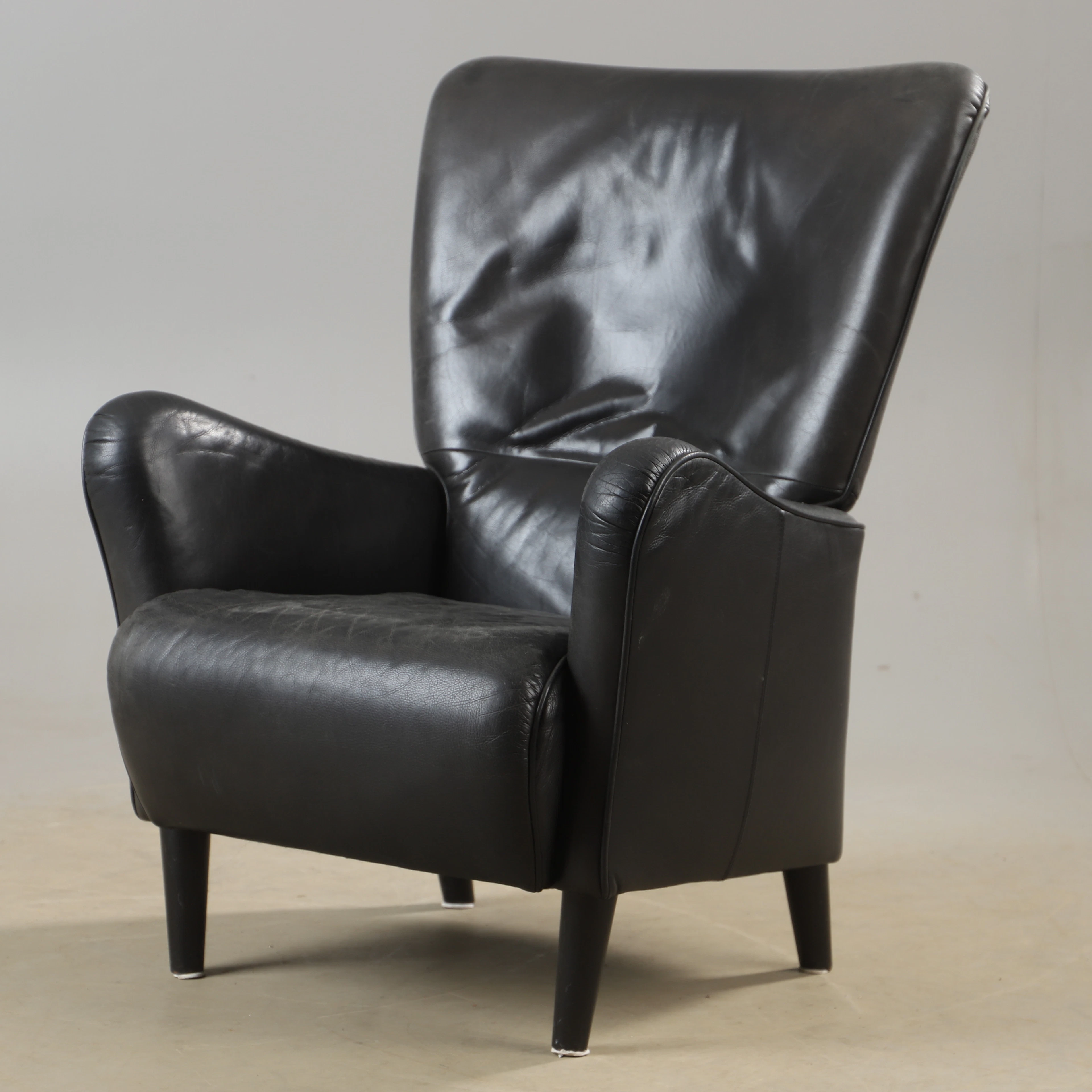 CARL-HENRIK SPAK. Vilfåtölj, "Stepp", skinnklädd, Swedese, 2000-tal.