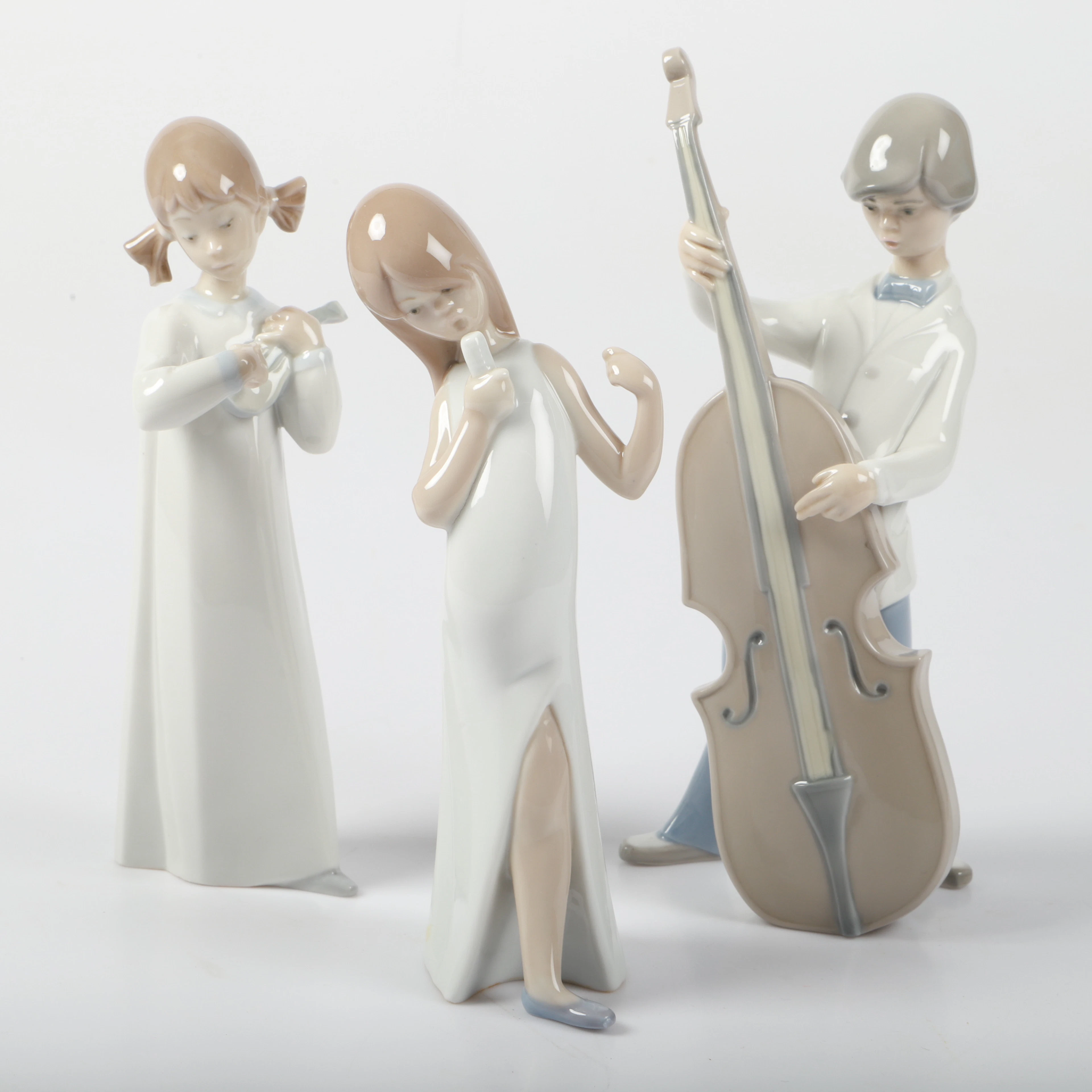 FIGURINER, 3 stycken, porslin, Lladro samt Nao.