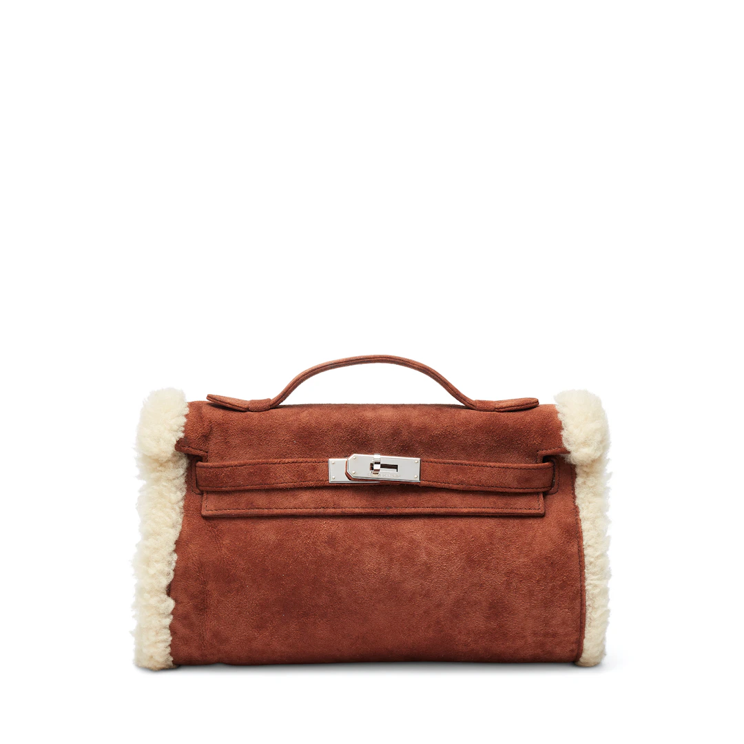 A RARE, LIMITED EDITION CHOCOLAT VEAU DOBLIS SHEARLING MUFF WITH PALLADIUM