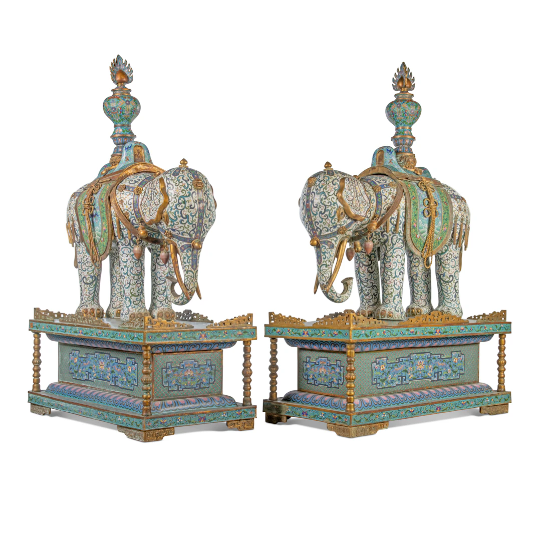 A PAIR OF LARGE CHINESE CLOISONNE ENAMEL ELEPHANTS ON STANDS