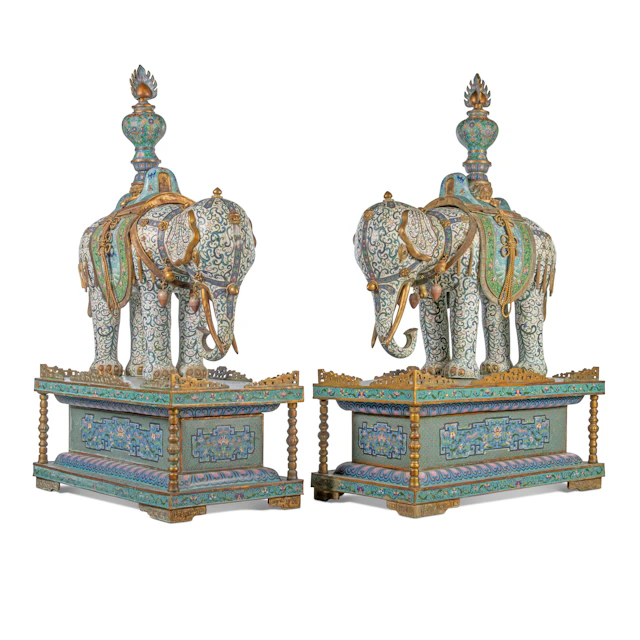 A PAIR OF LARGE CHINESE CLOISONNE ENAMEL ELEPHANTS ON STANDS