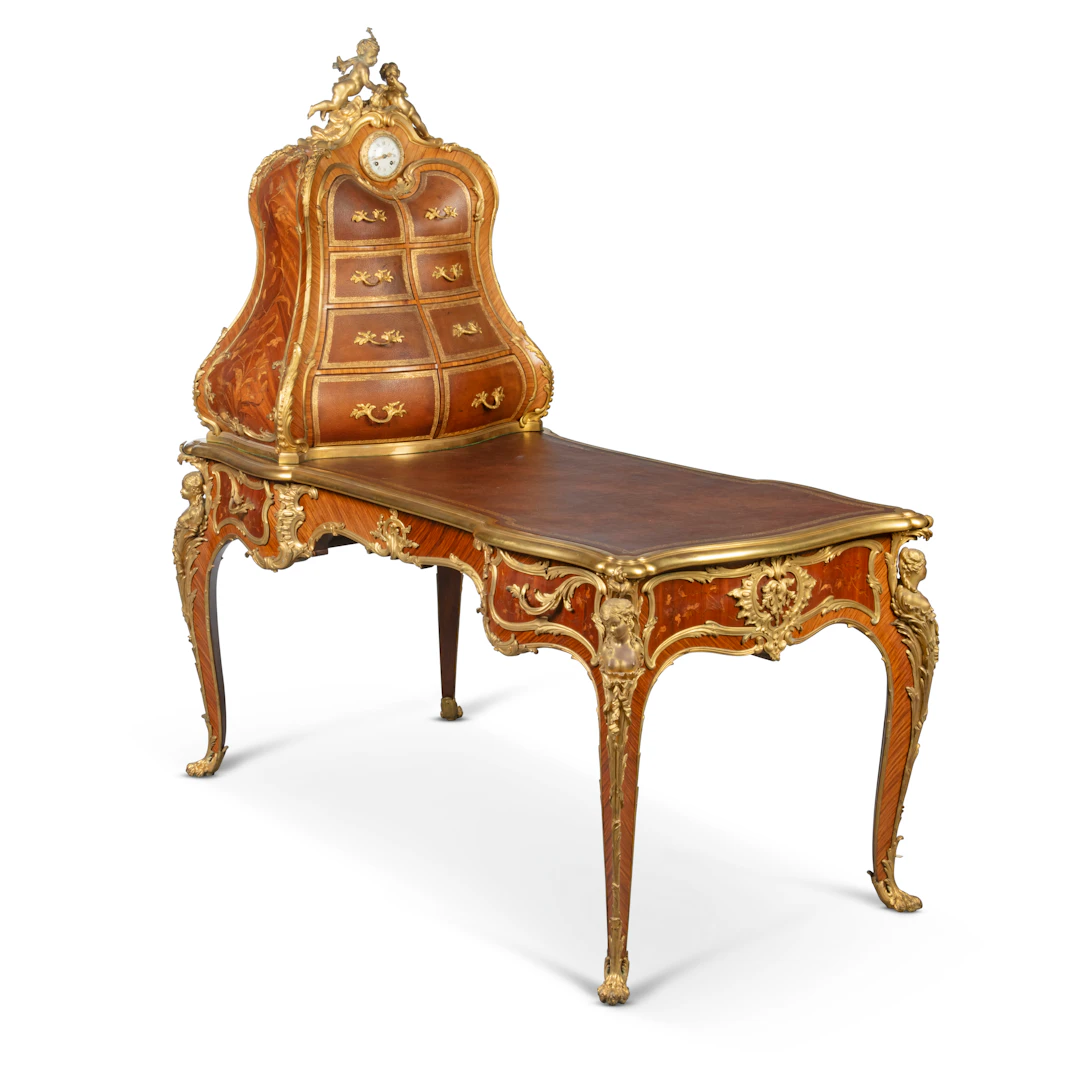 A FRENCH ORMOLU-MOUNTED KINGWOOD, TULIPWOOD AND MARQUETRY BUREAU PLAT