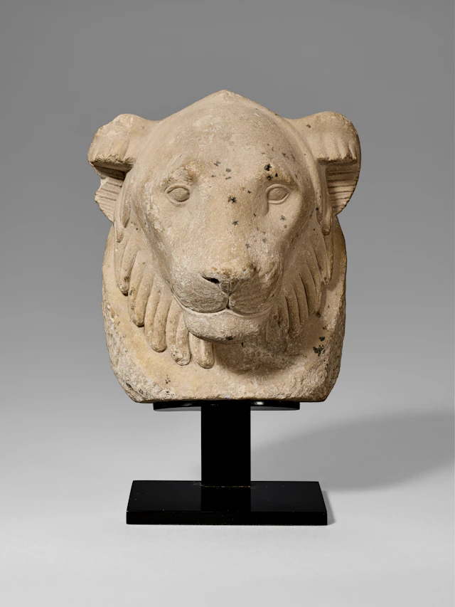 AN EGYPTIAN LIMESTONE LION HEAD SCULPTOR'S MODEL