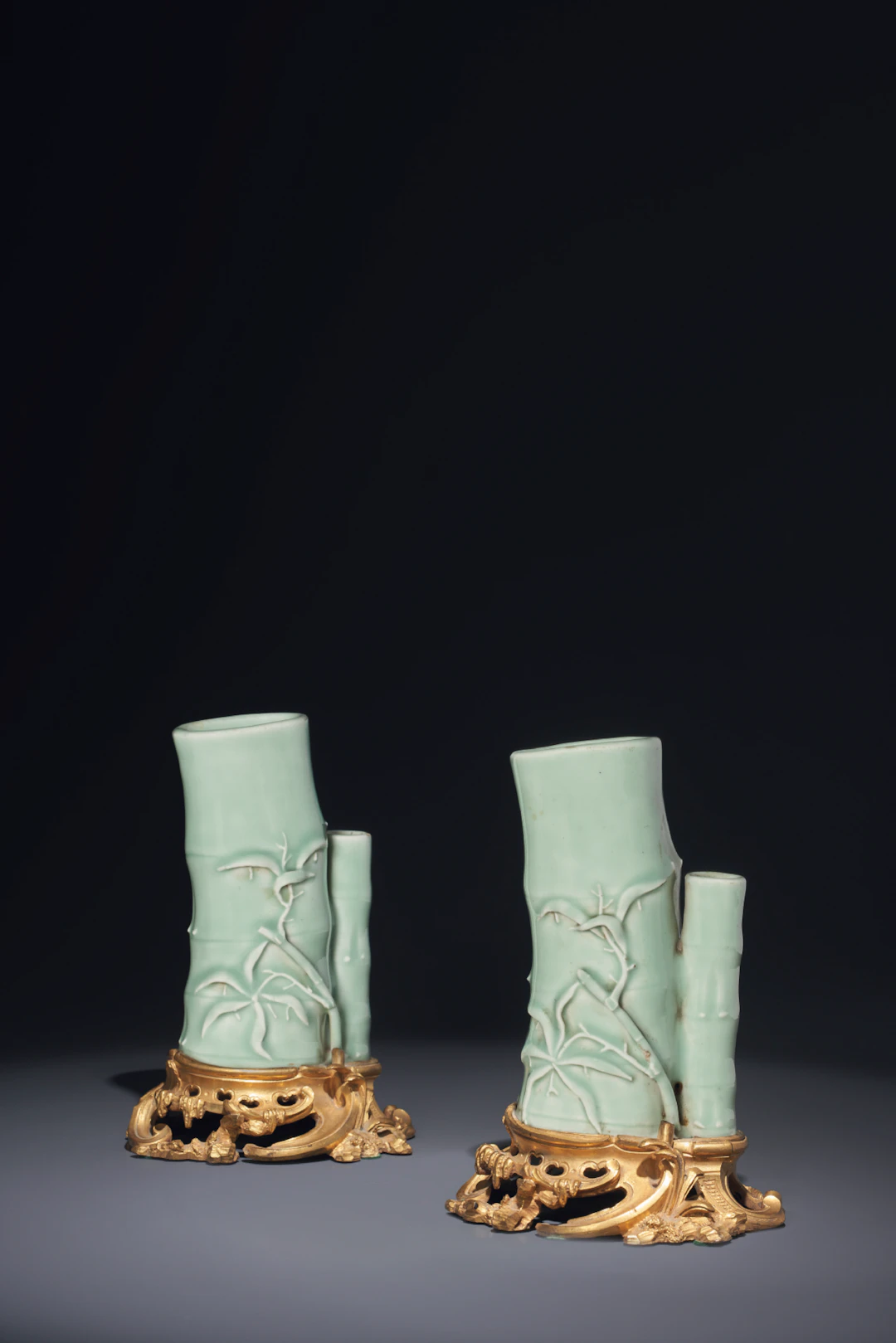 A PAIR OF LOUIS XV ORMOLU-MOUNTED CHINESE CELADON PORCELAIN BAMBOO-FORM