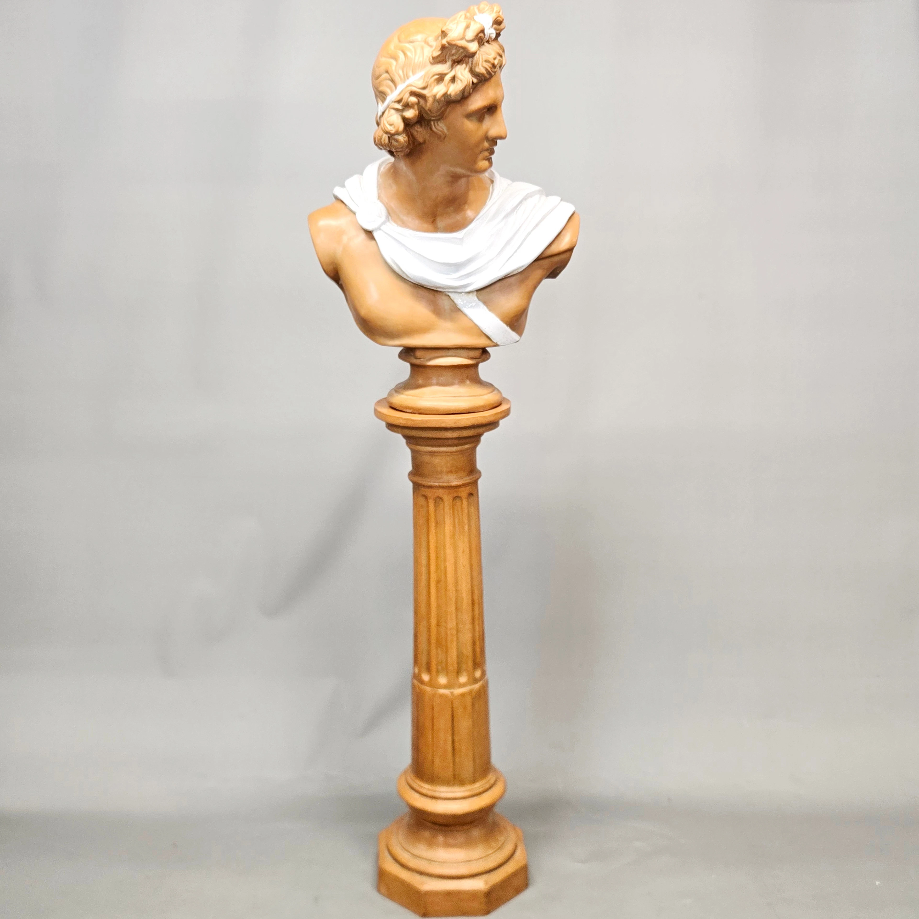 LARGE CERAMIC BUST ON STAND.