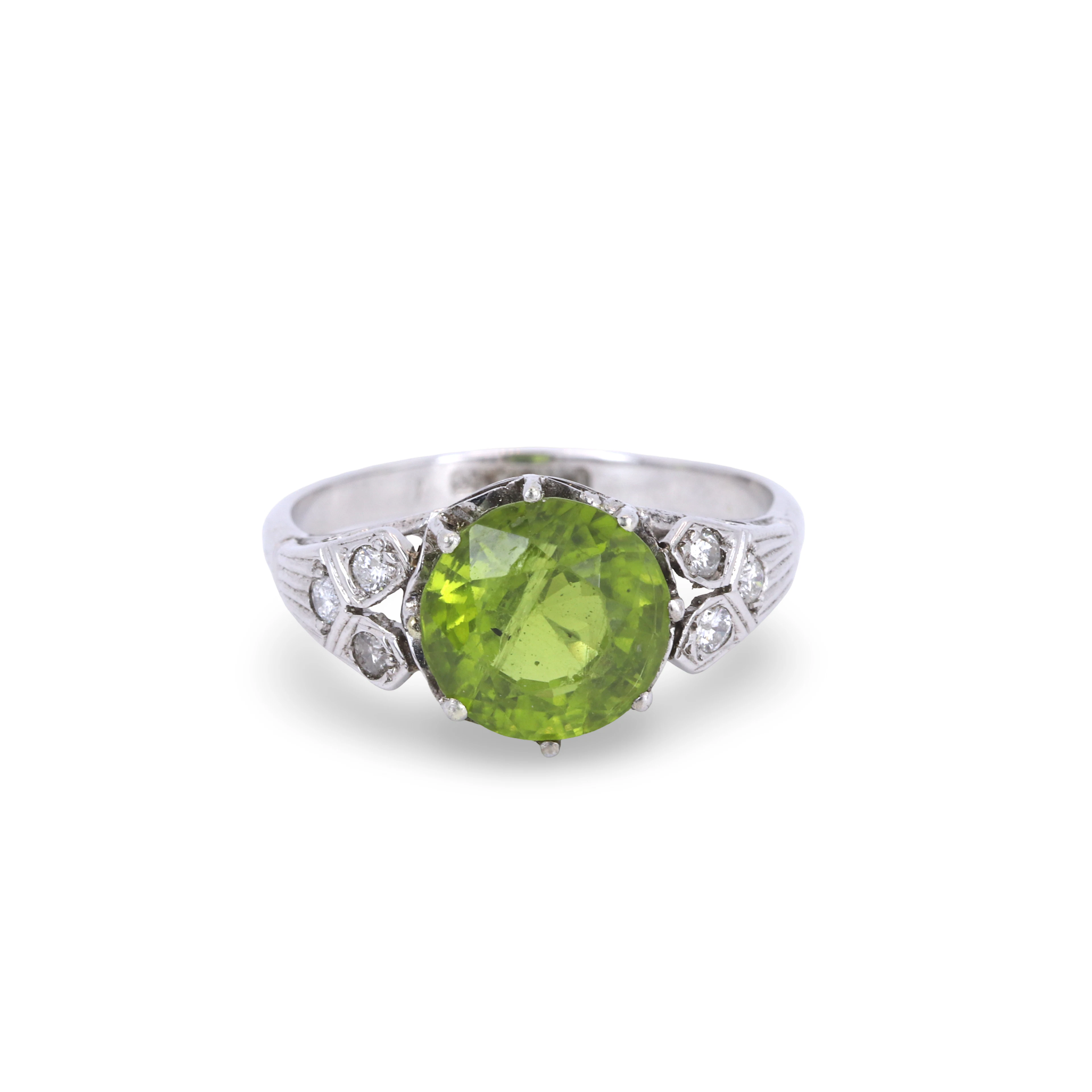 18CT GOLD & PLATINUM PERIDOT & DIAMOND RING.