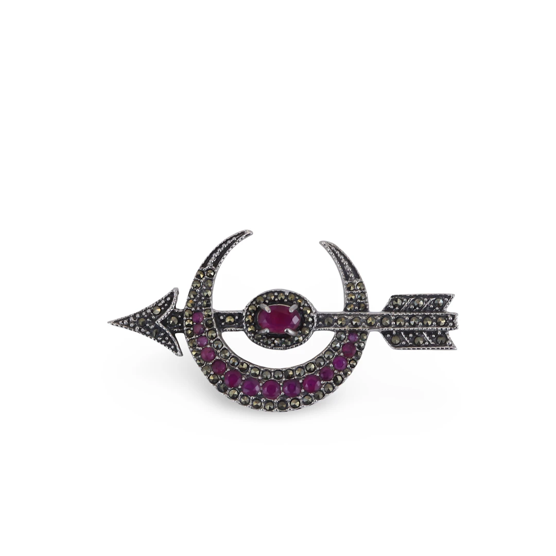 SILVER CRESCENT MOON BROOCH.