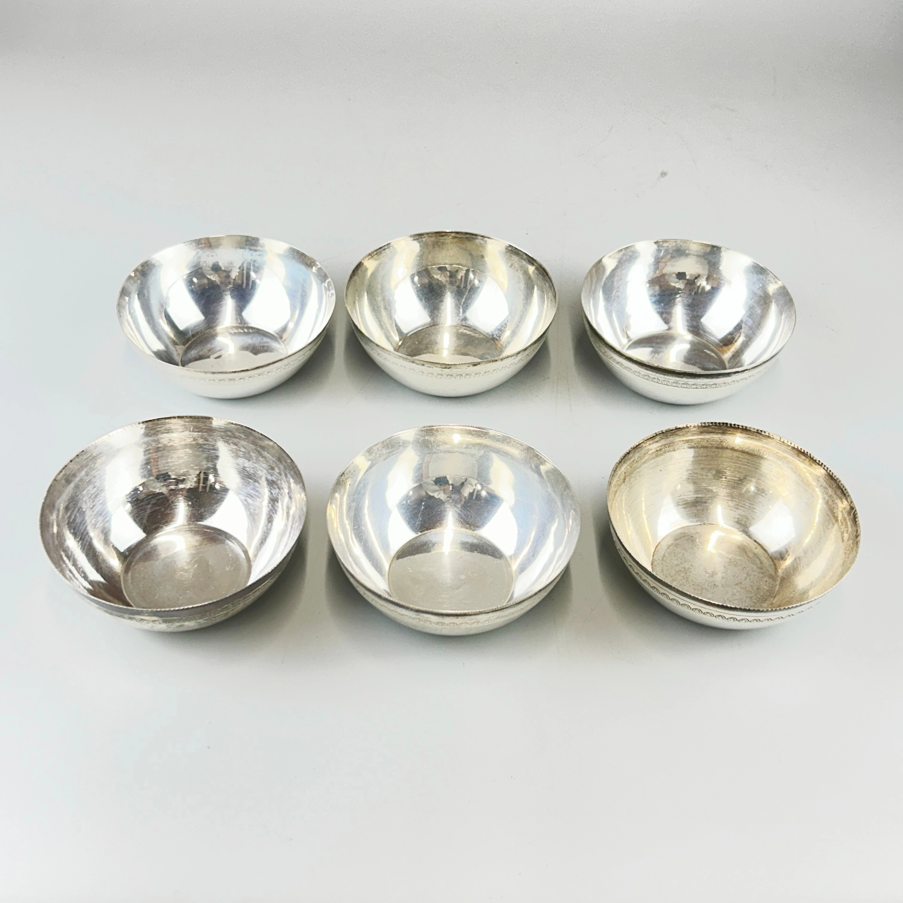 SIX EASTERN SILVER BOWLS.