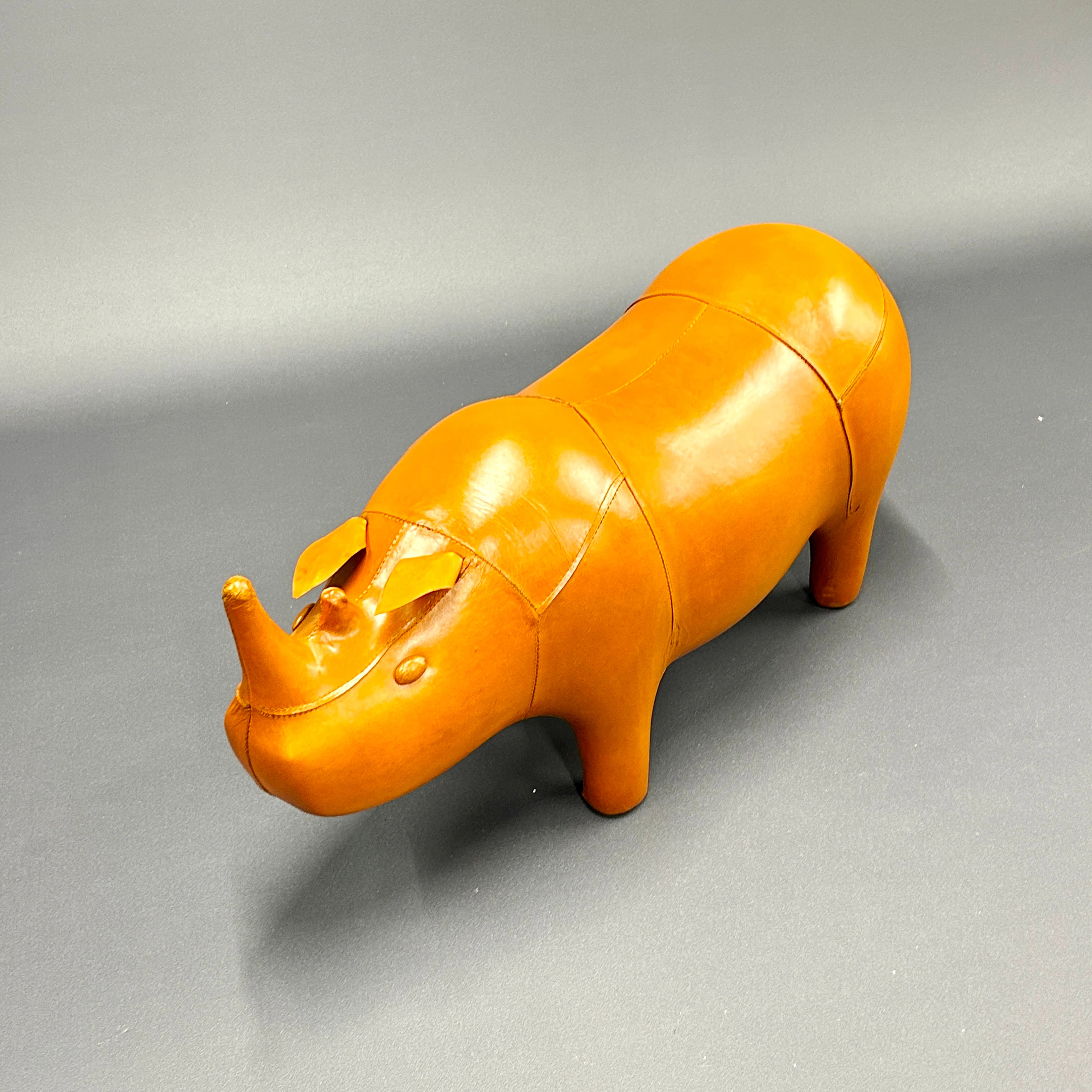 LEATHER RHINOCEROS FOOTSTOOL.