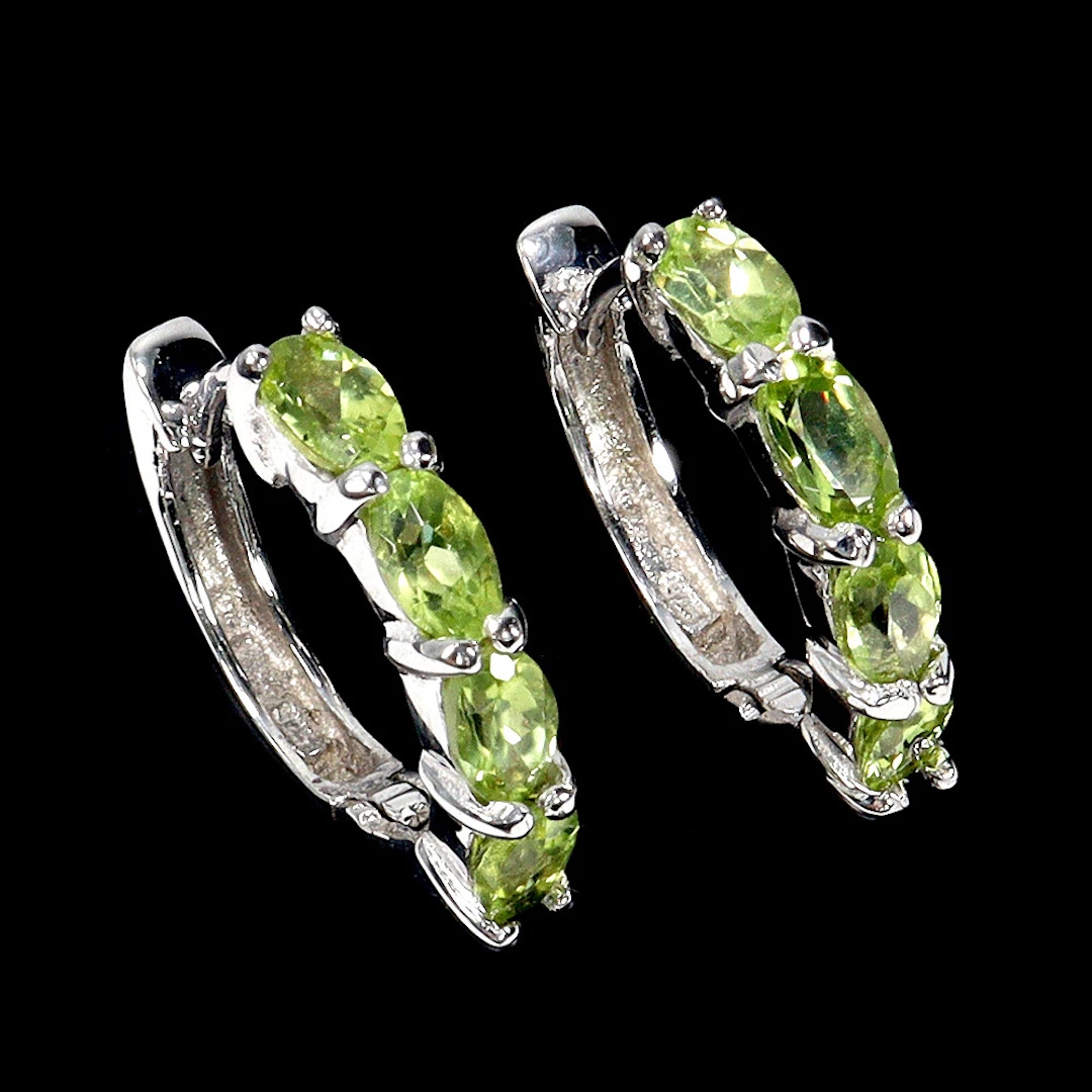 PERIDOT SILVER HOOP EARRINGS.
