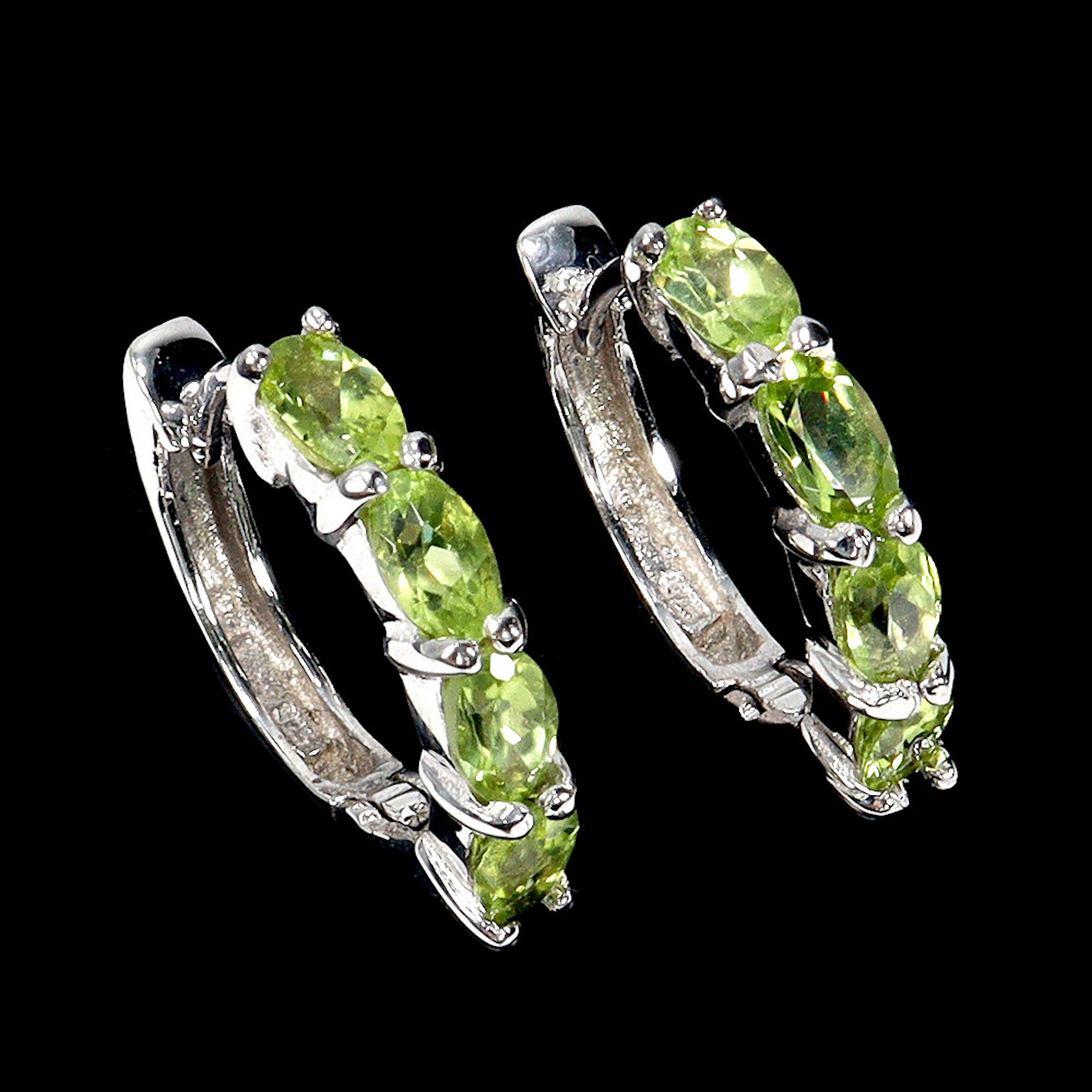 PERIDOT SILVER HOOP EARRINGS.