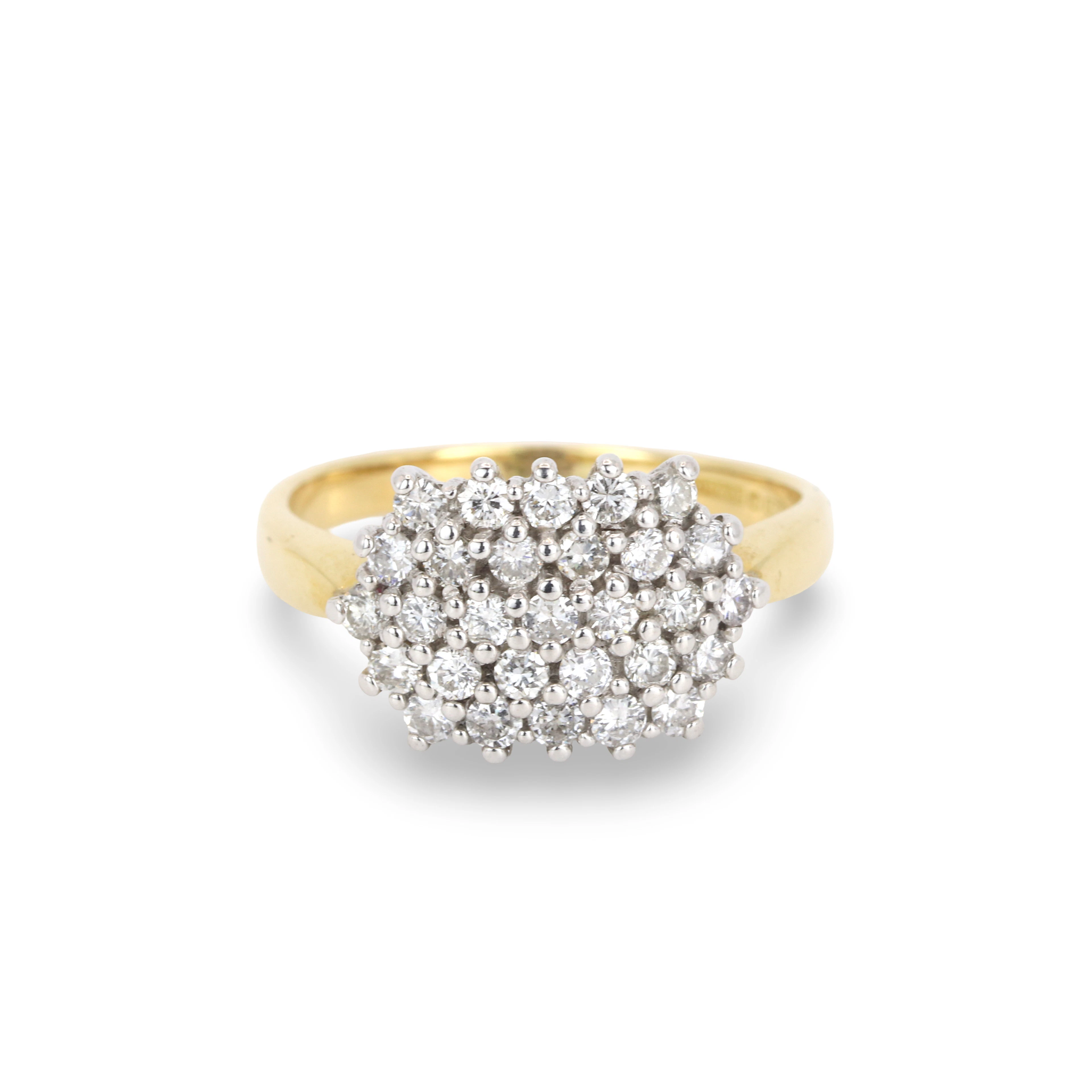 18CT GOLD DIAMOND CLUSTER RING.