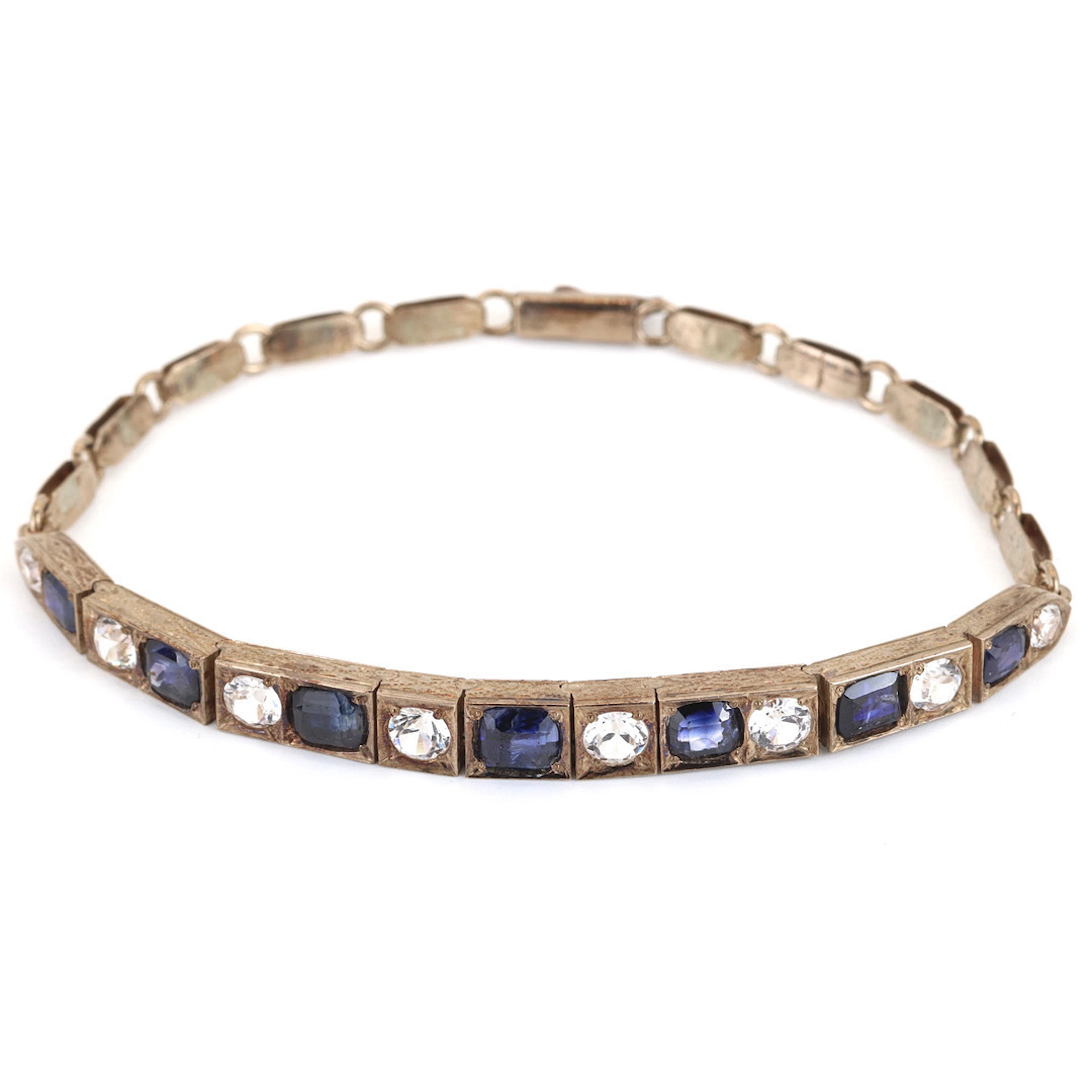9CT GOLD BLUE & WHITE SAPPHIRE BRACELET.