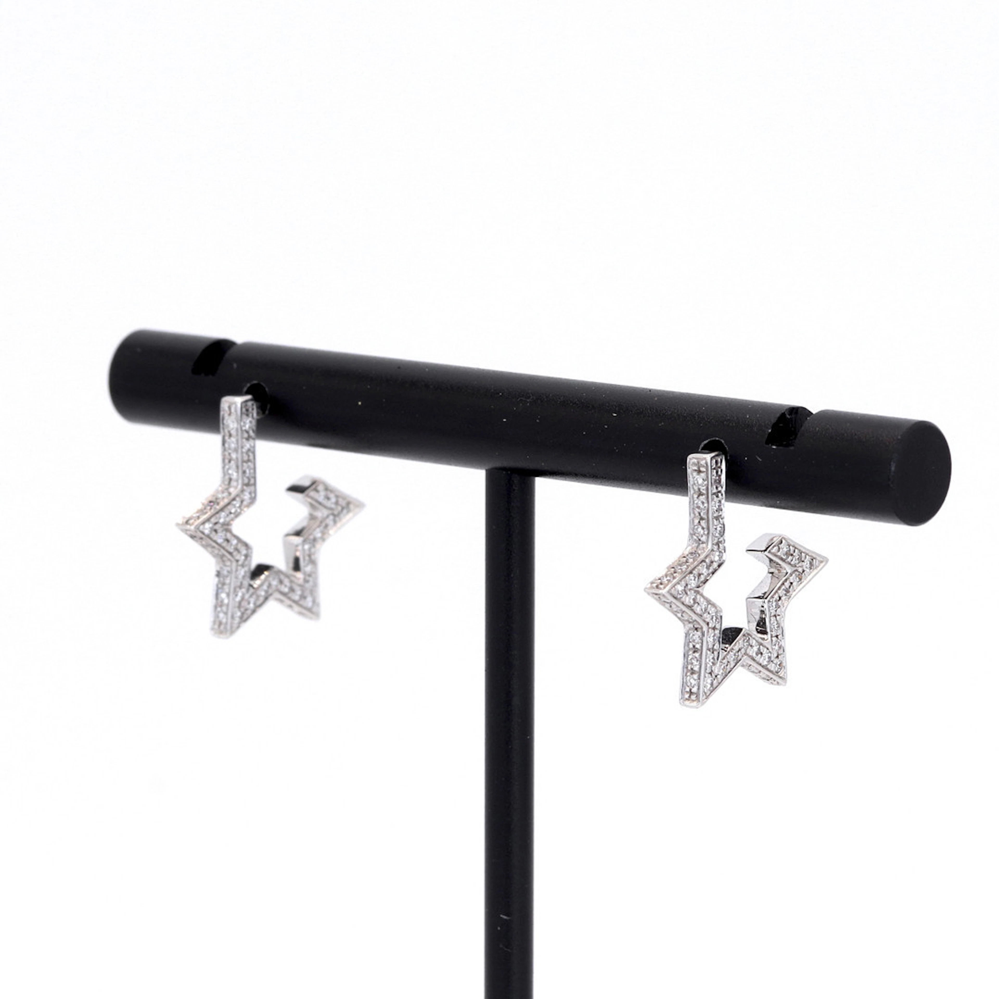 18CT STAR DIAMOND EARRINGS.