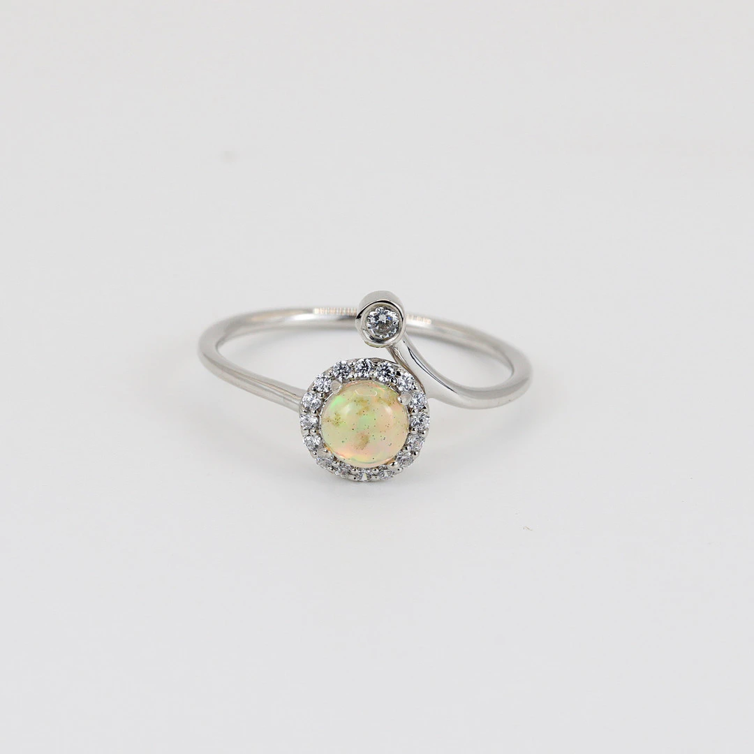SILVER OPAL SET RING.