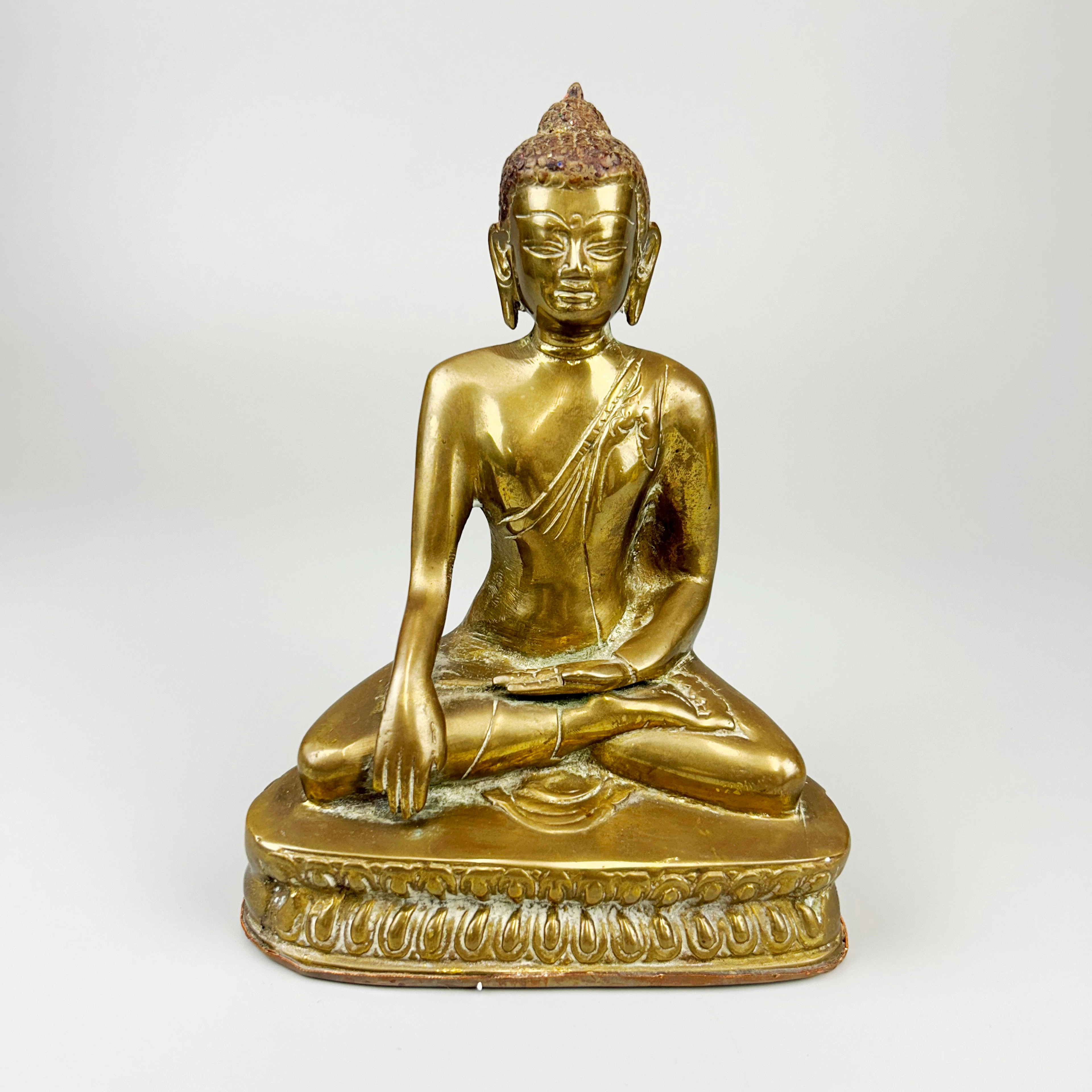 BRONZE BUDDHA.