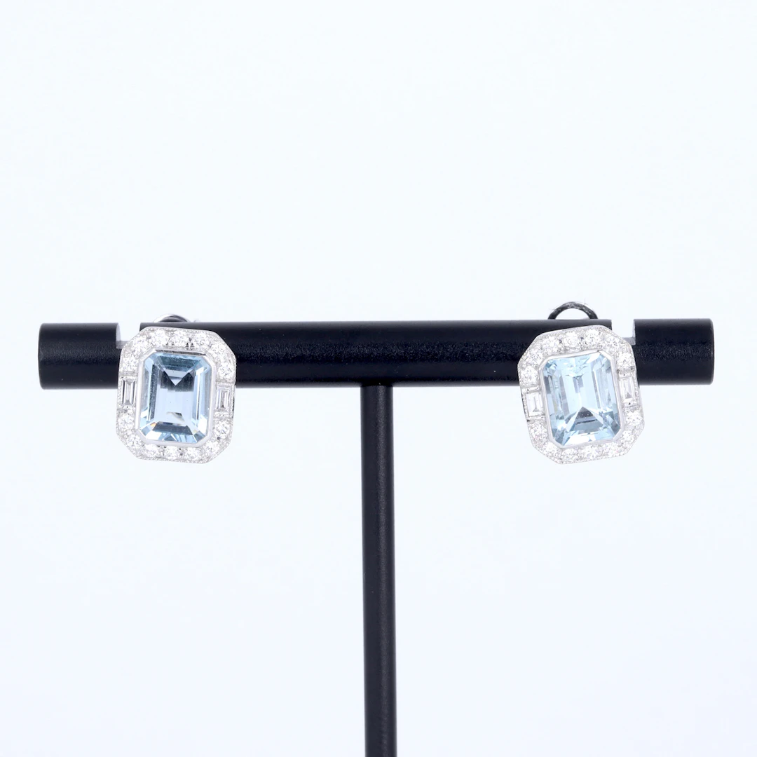 18CT AQUAMARINE AND DIAMOND EARRINGS.