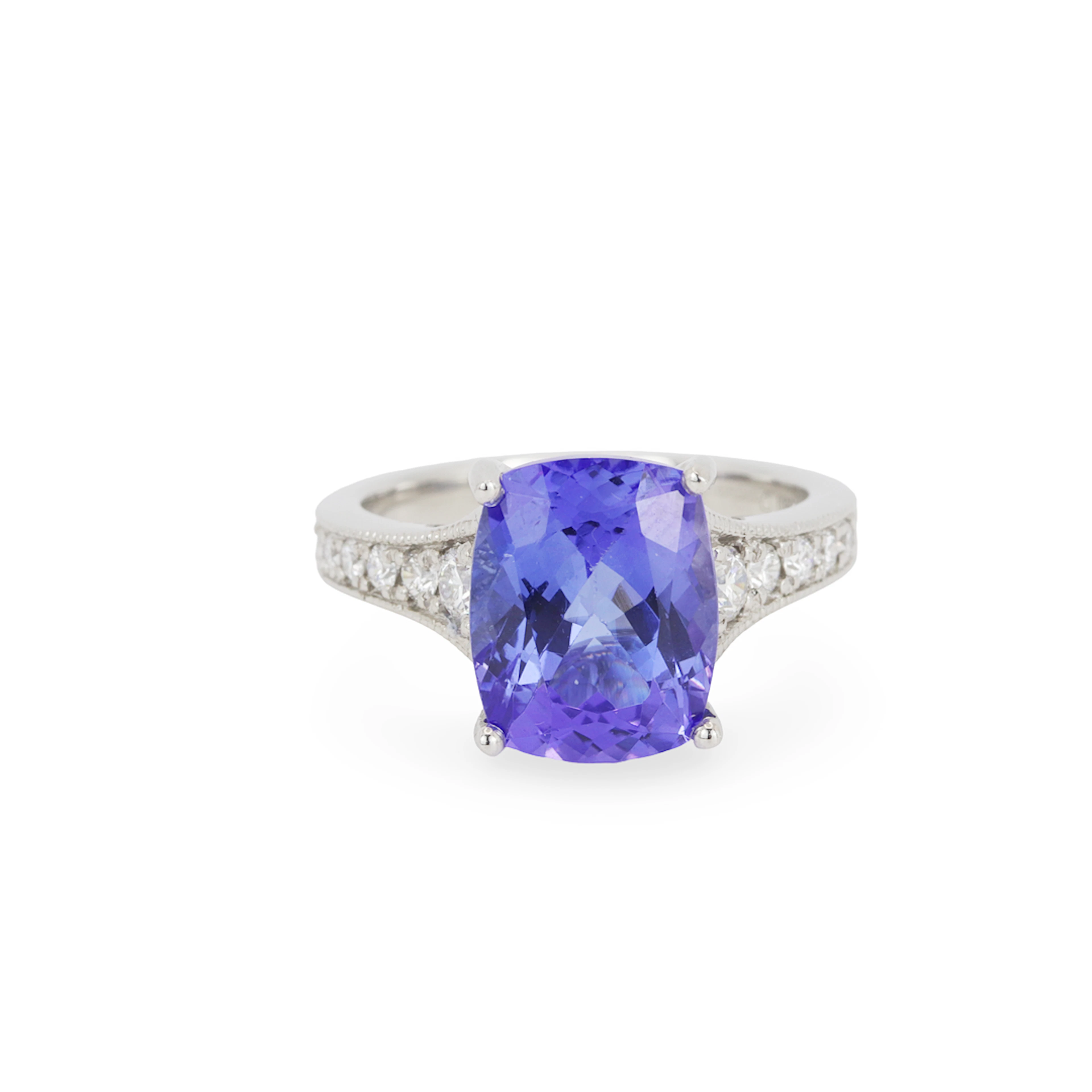 PLATINUM TANZANITE & DIAMOND RING.