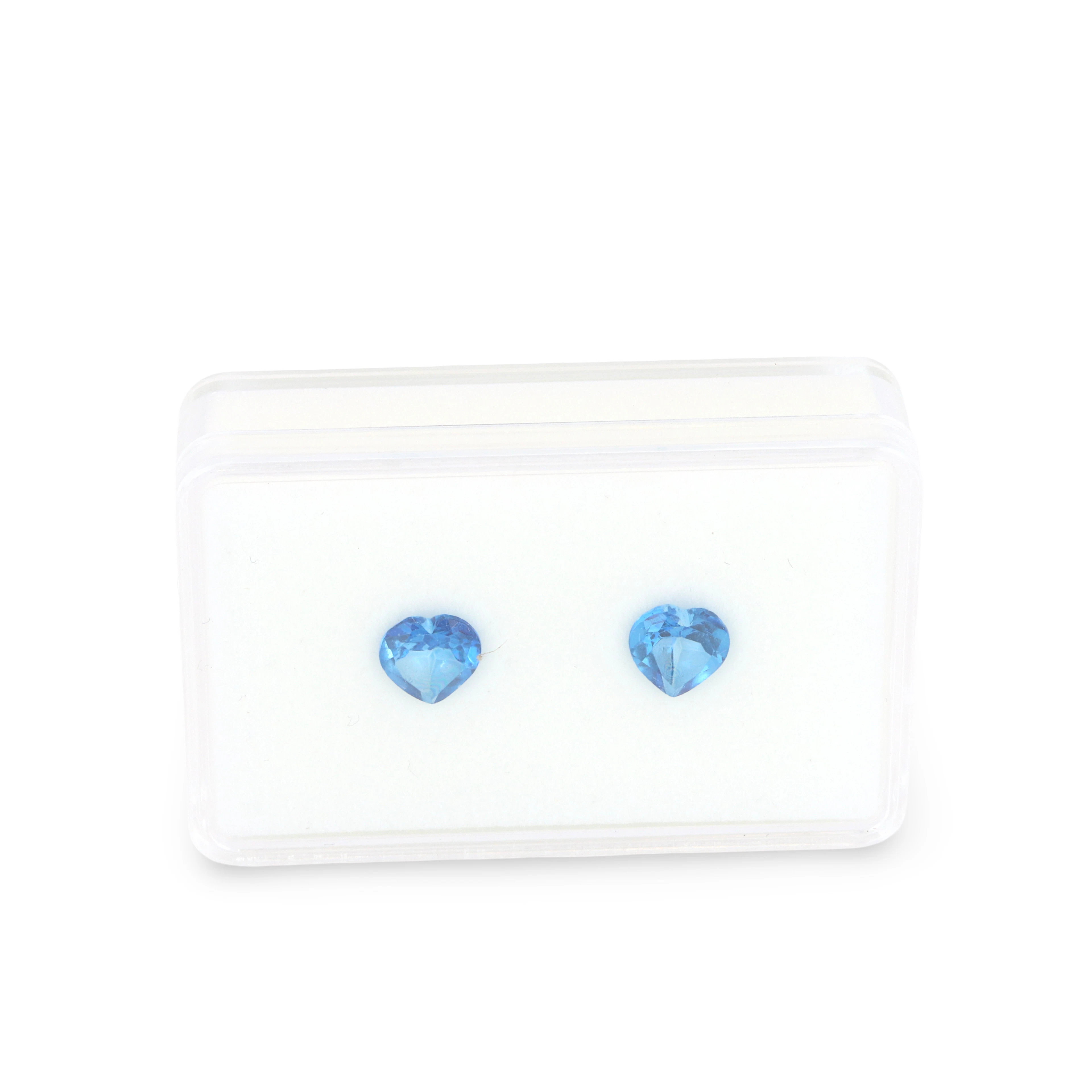 ATURAL HEART SHAPED TOPAZ.