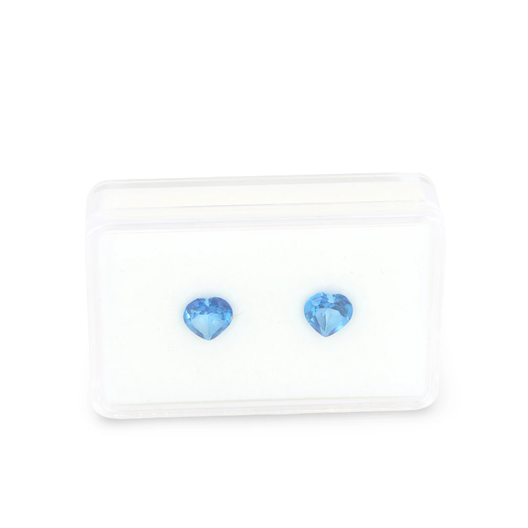 ATURAL HEART SHAPED TOPAZ.