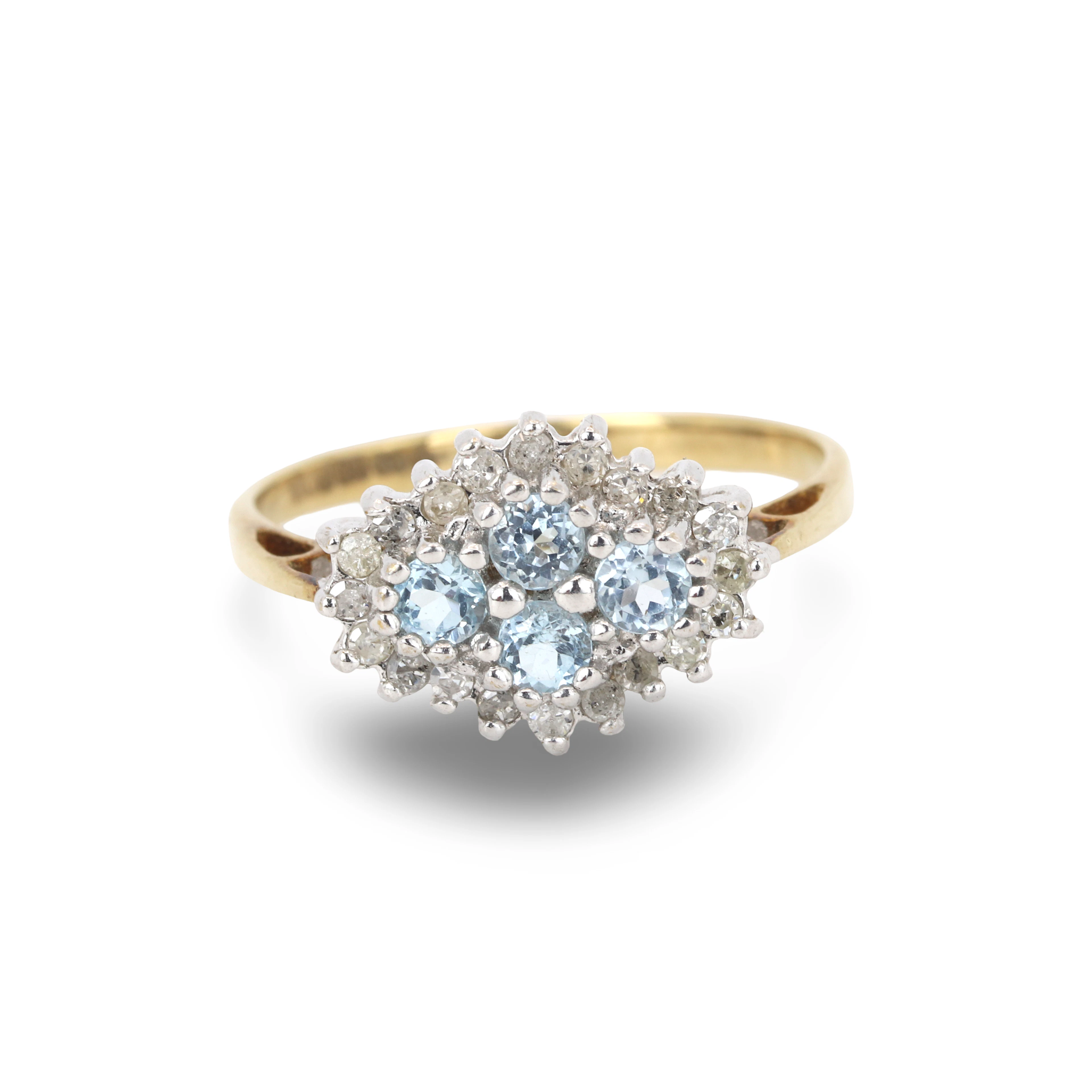 AQUAMARINE AND DIAMOND RING.