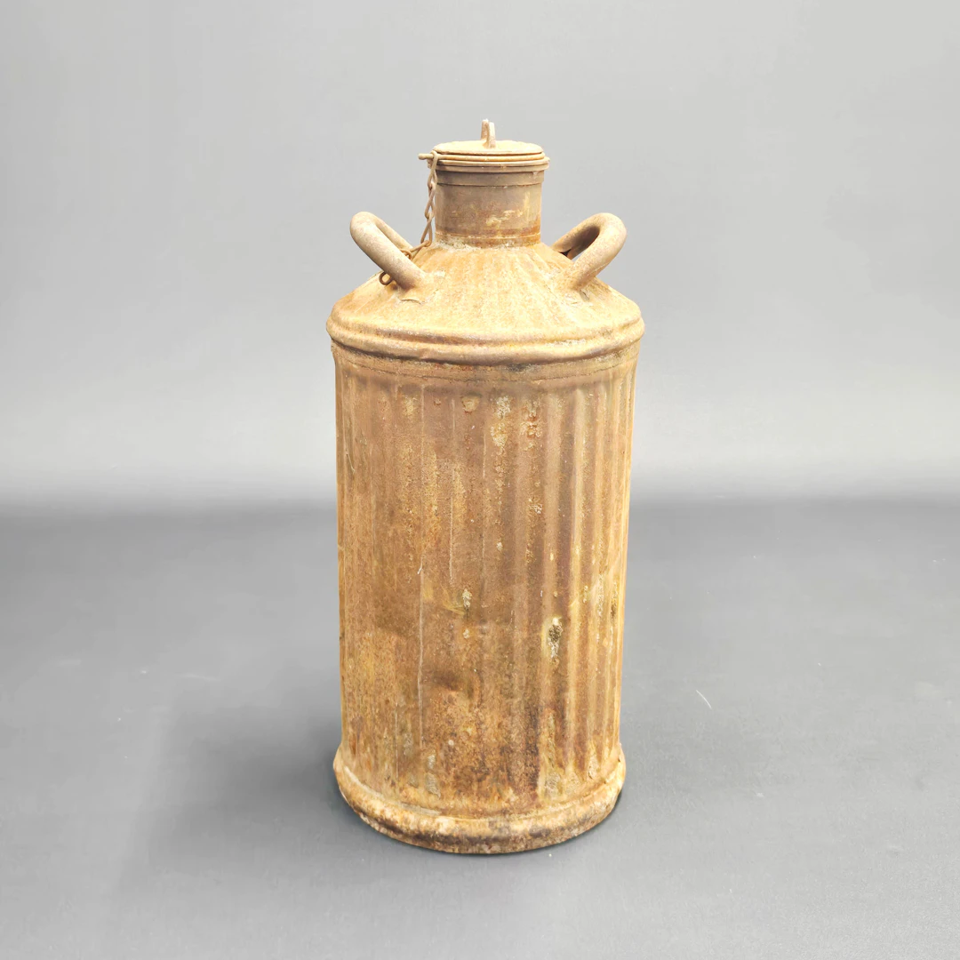 METAL MILK CHURN.